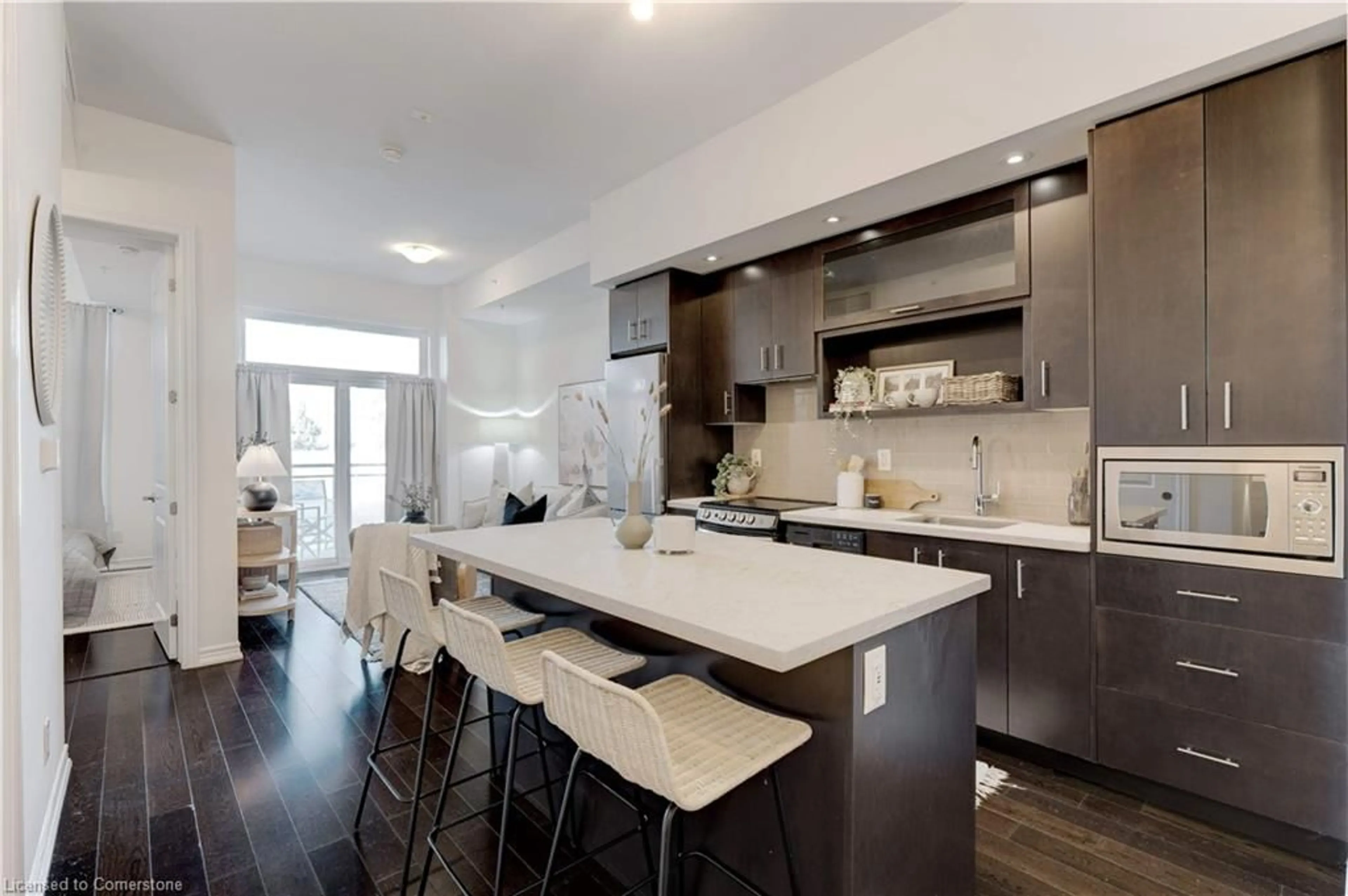 Open concept kitchen, wood/laminate floor for 457 Plains Rd #110, Burlington Ontario L7T 0B8