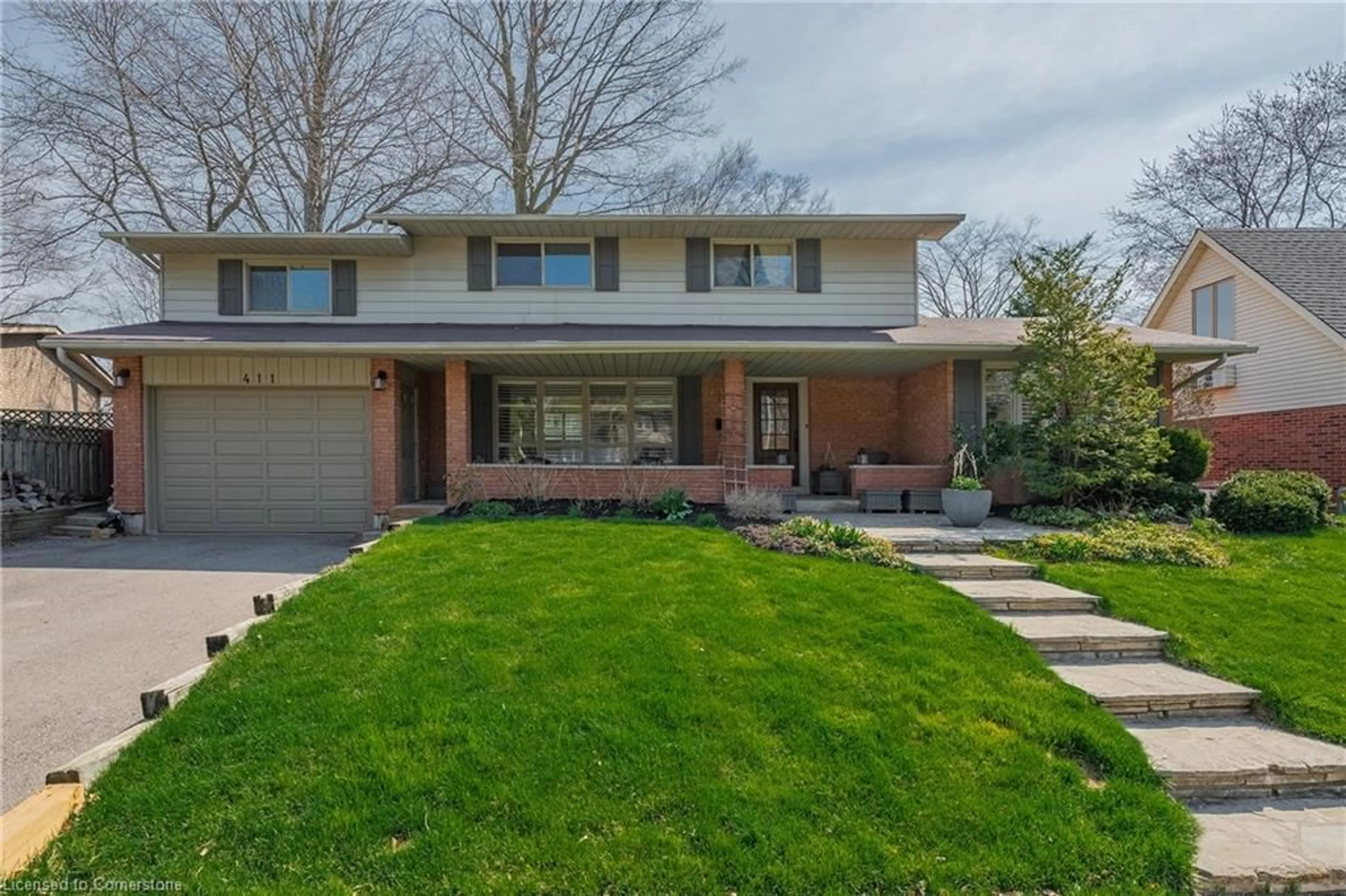 Home with brick exterior material, street for 411 Canterbury Cres, Oakville Ontario L6J 5K8