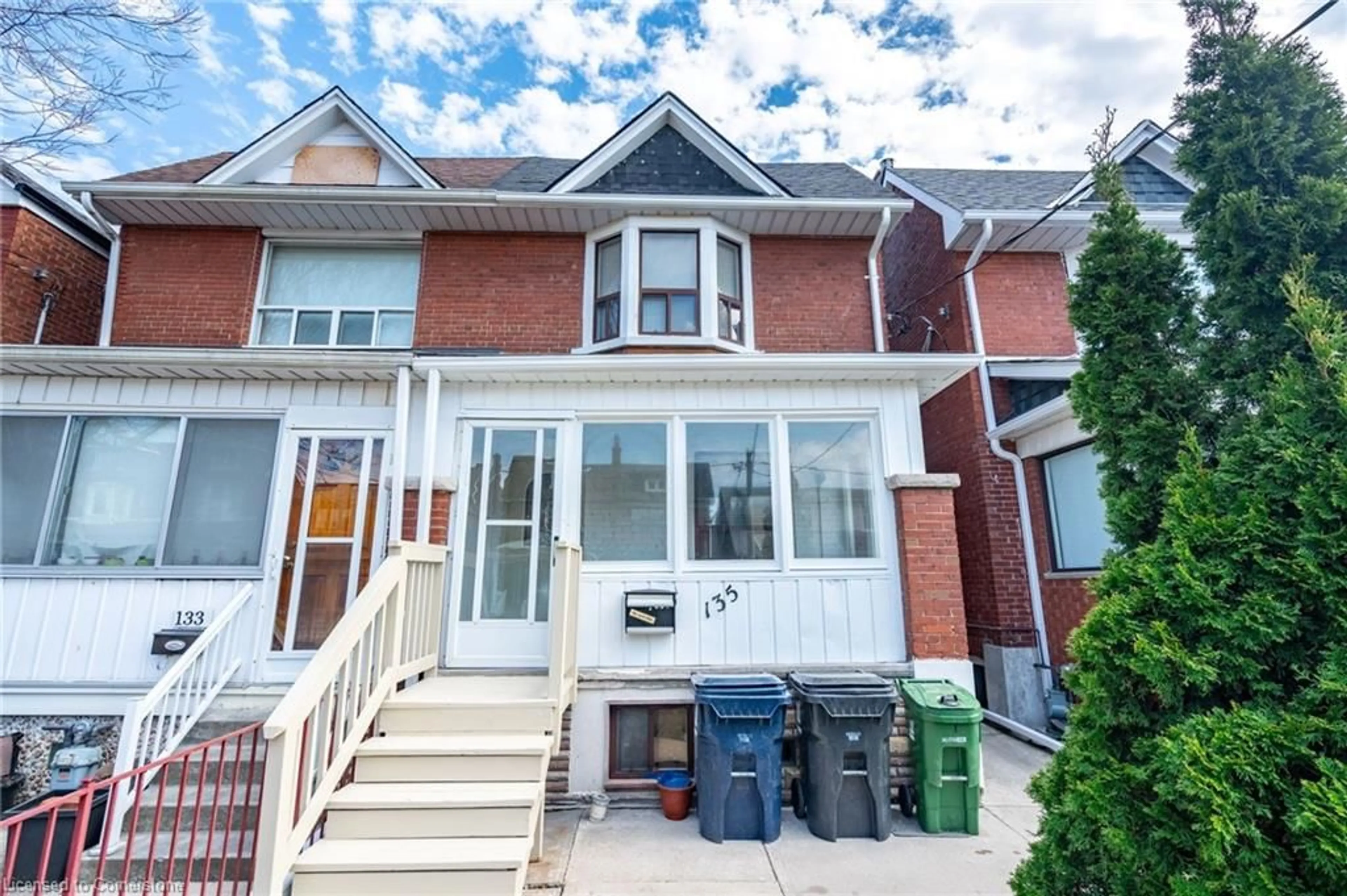 Home with brick exterior material, street for 135 Hope St, Toronto Ontario M6E 1K2