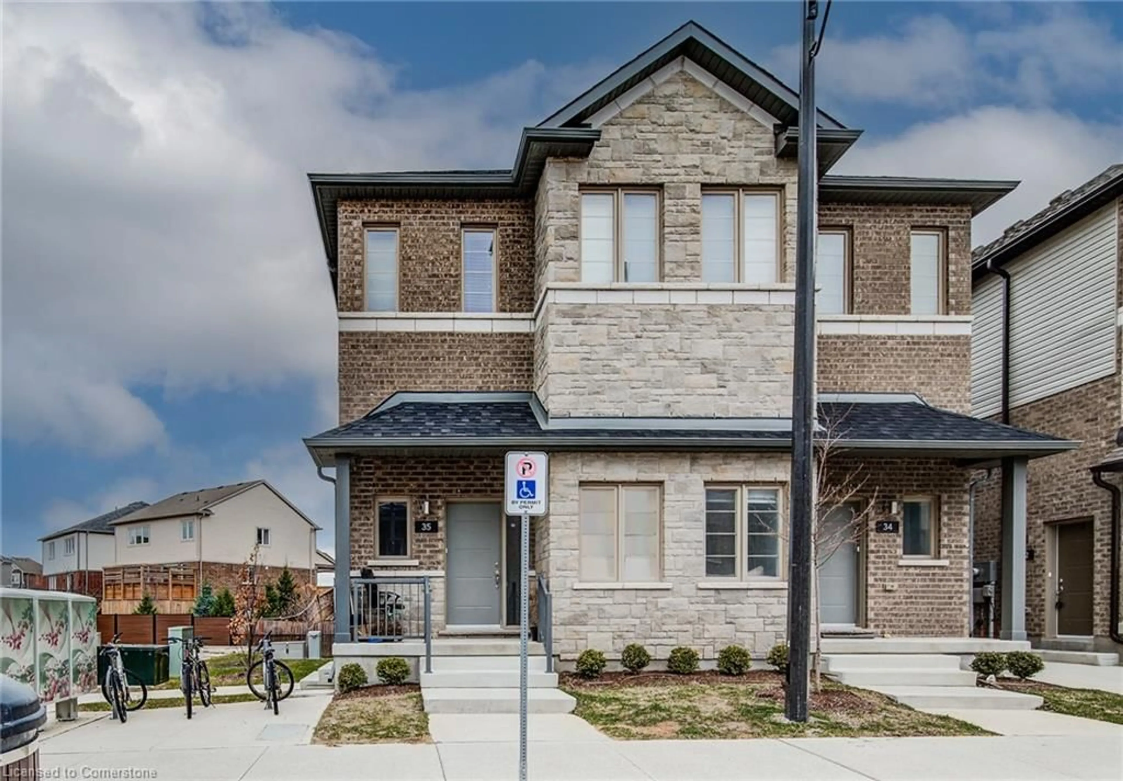 Home with brick exterior material, street for 205 West Oak Trail #35, Kitchener Ontario N2R 0R9