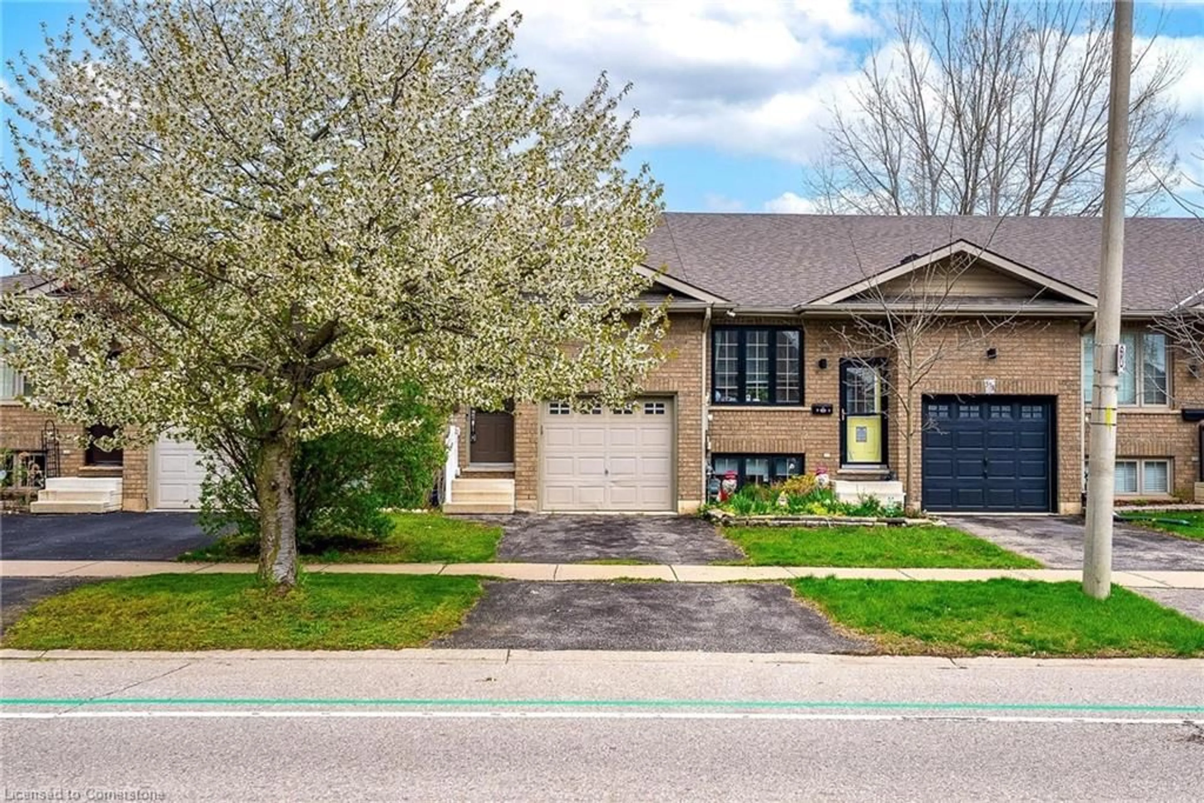 Home with brick exterior material, street for 576 Grey St, Brantford Ontario N3S 4Y1