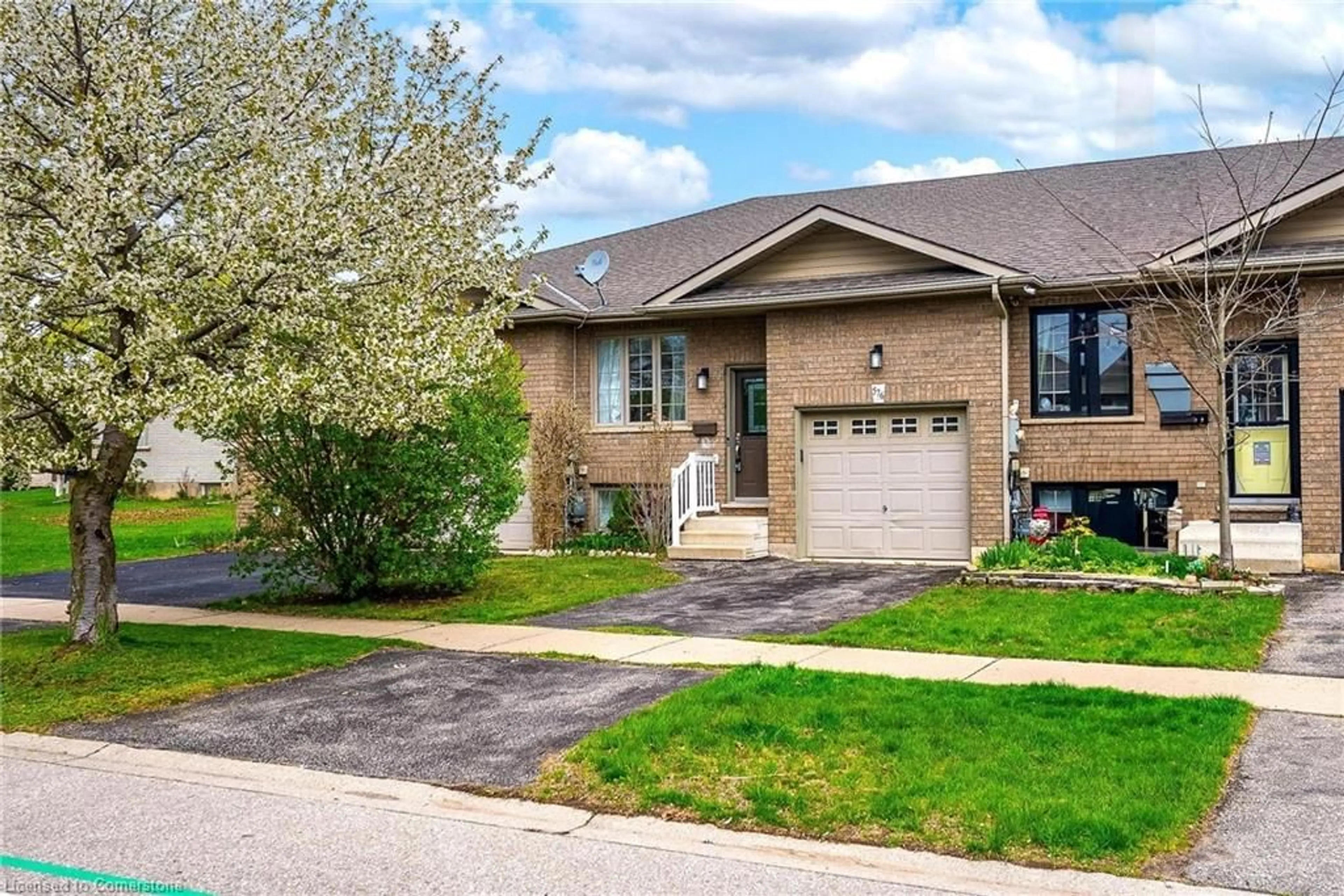 Home with brick exterior material, street for 576 Grey St, Brantford Ontario N3S 4Y1
