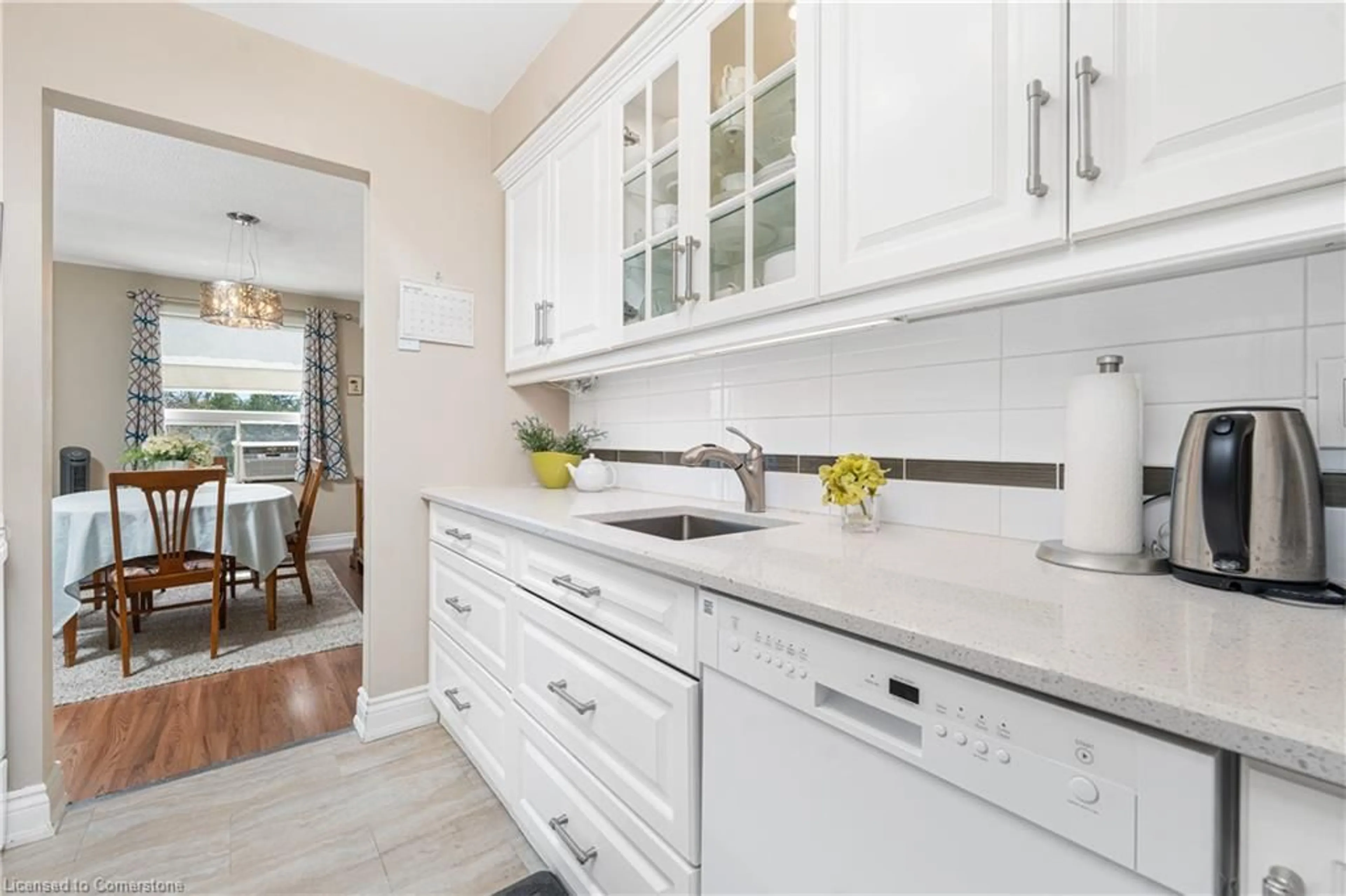 Open concept kitchen, ceramic/tile floor for 4209 Hixon St #308, Beamsville Ontario L3J 0K2