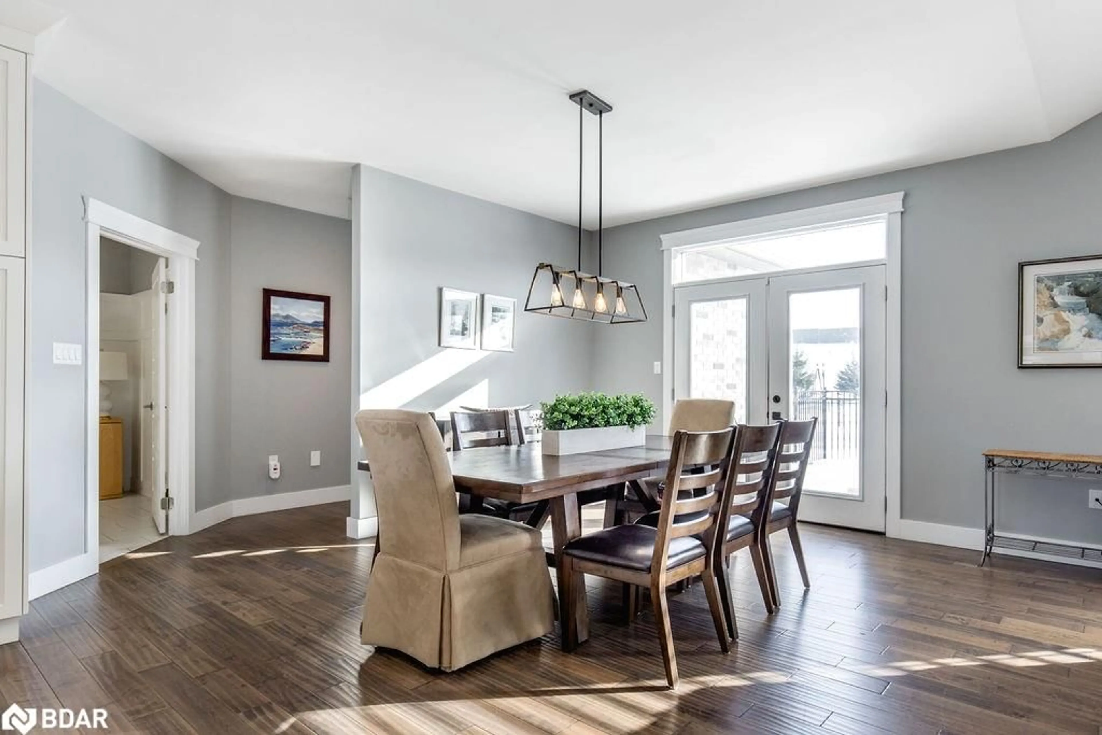 Dining room, wood/laminate floor for 25 Mennill Dr, Snow Valley Ontario L0L 1Y3