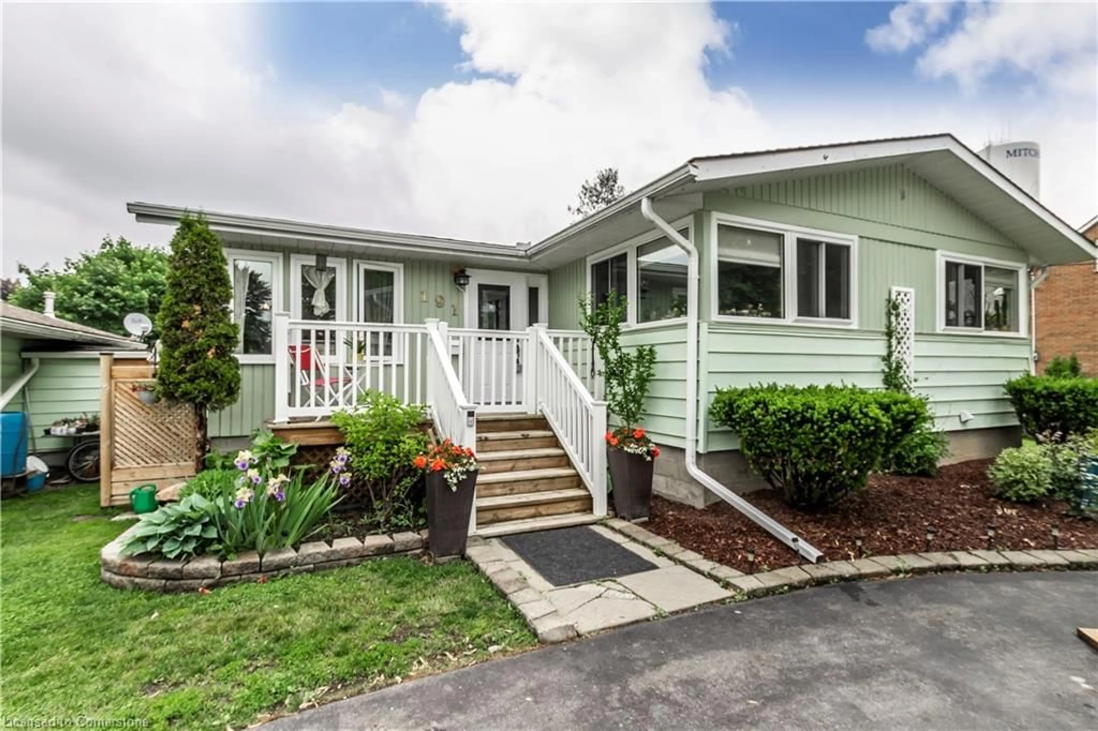 Home with vinyl exterior material, street for 191 Kent St, Mitchell Ontario N0K 1N0