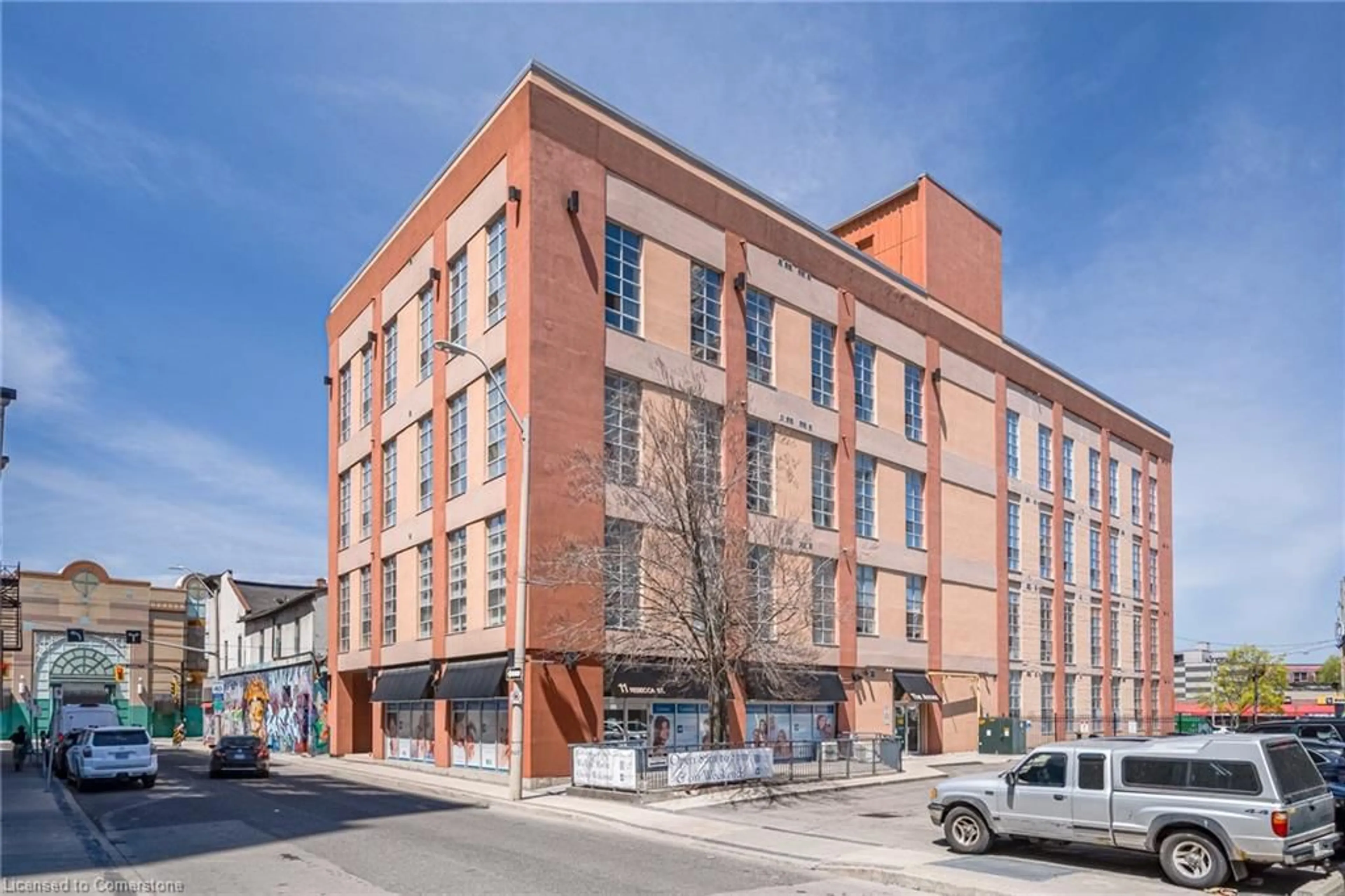 Home with brick exterior material, building for 11 Rebecca St #401, Hamilton Ontario L8R 3H7
