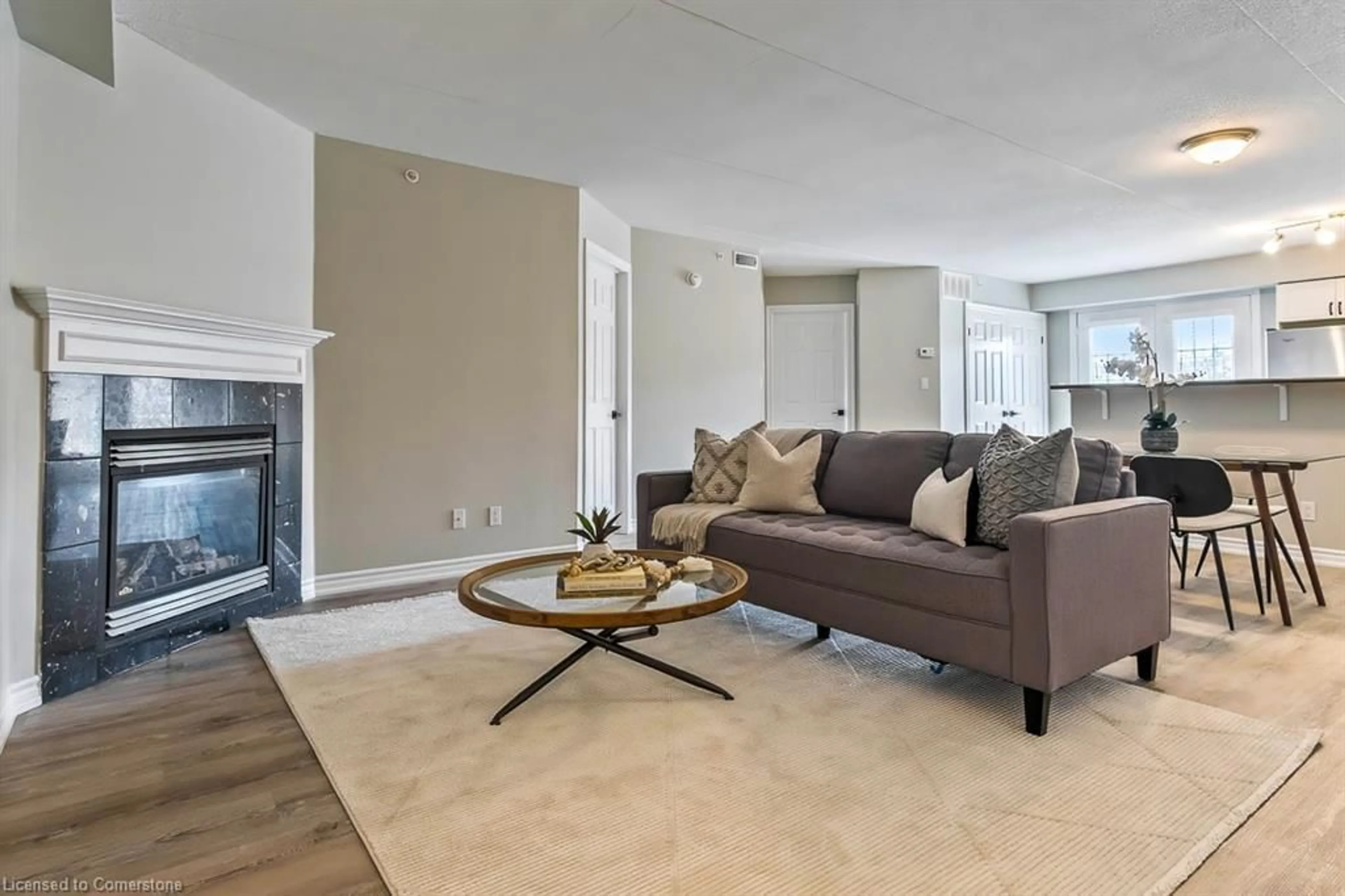 Living room with furniture, carpet floor for 1830 Walkers Line #301, Burlington Ontario L7M 4V5