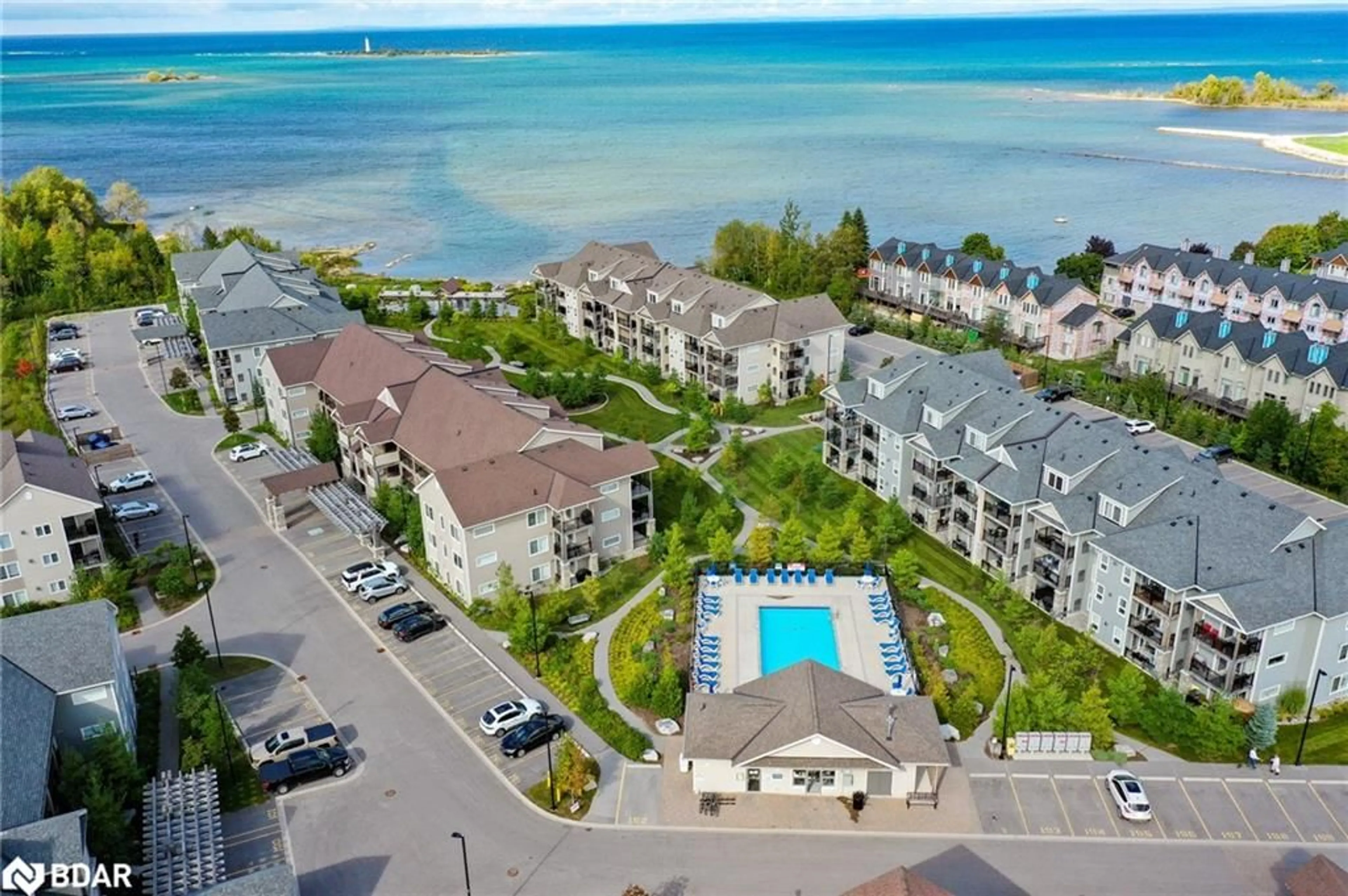 A pic from outside/outdoor area/front of a property/back of a property/a pic from drone, water/lake/river/ocean view for 5 Anchorage Cres #202, Collingwood Ontario L9Y 0Y6