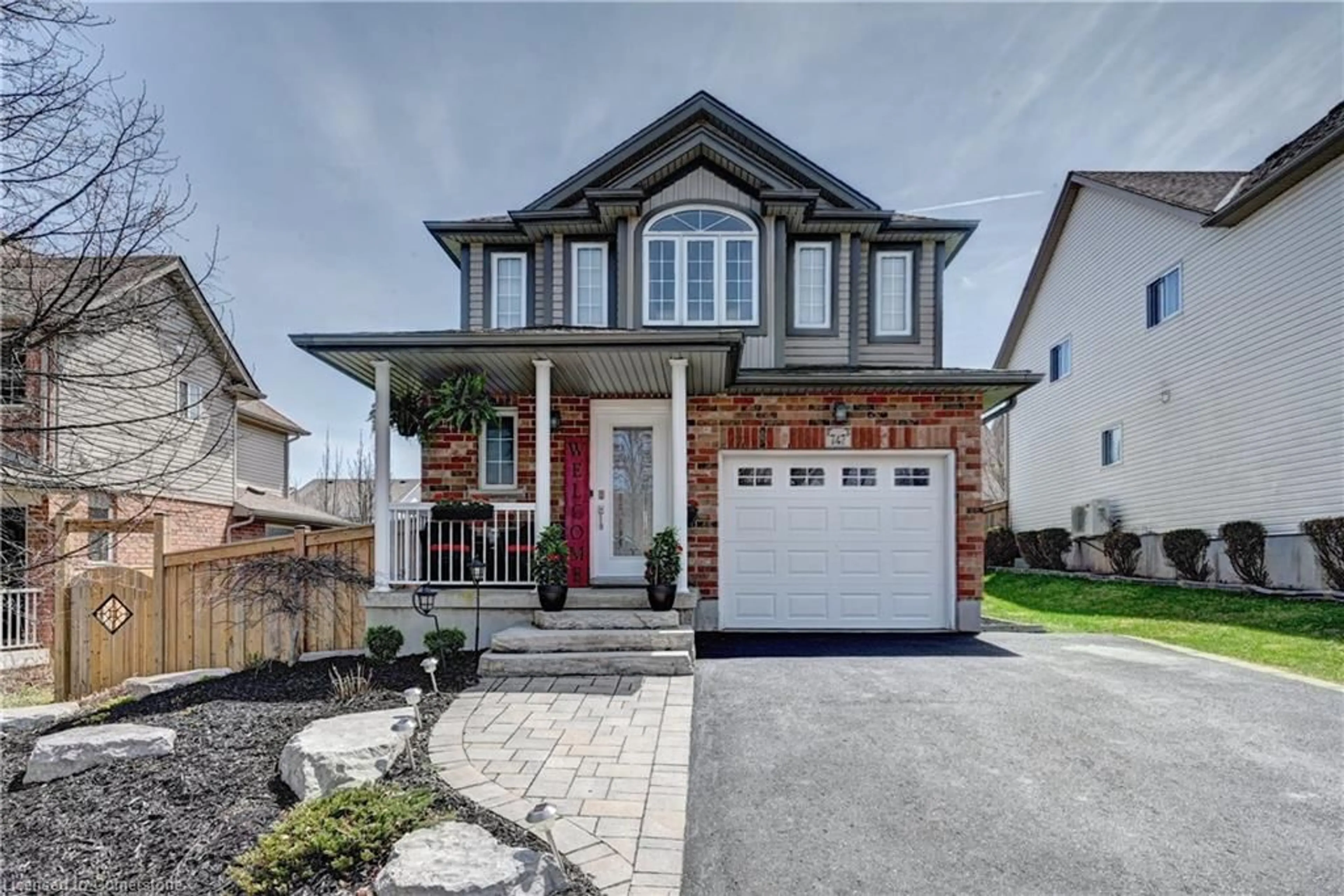 Home with brick exterior material, street for 747 Butternut Ave, Waterloo Ontario N2V 2M3