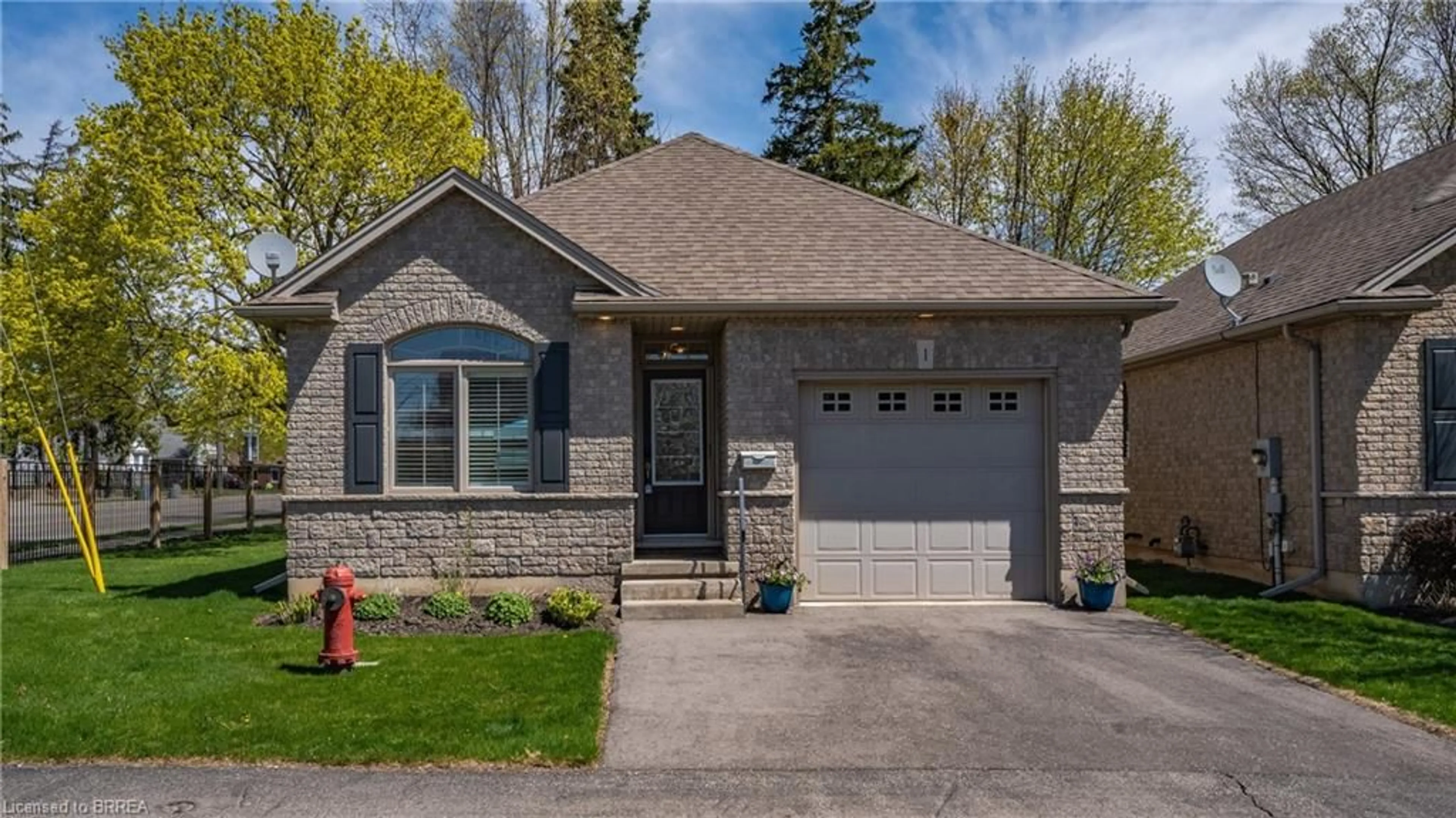 Home with brick exterior material, street for 95 North Park St #1, Brantford Ontario N3R 4K2