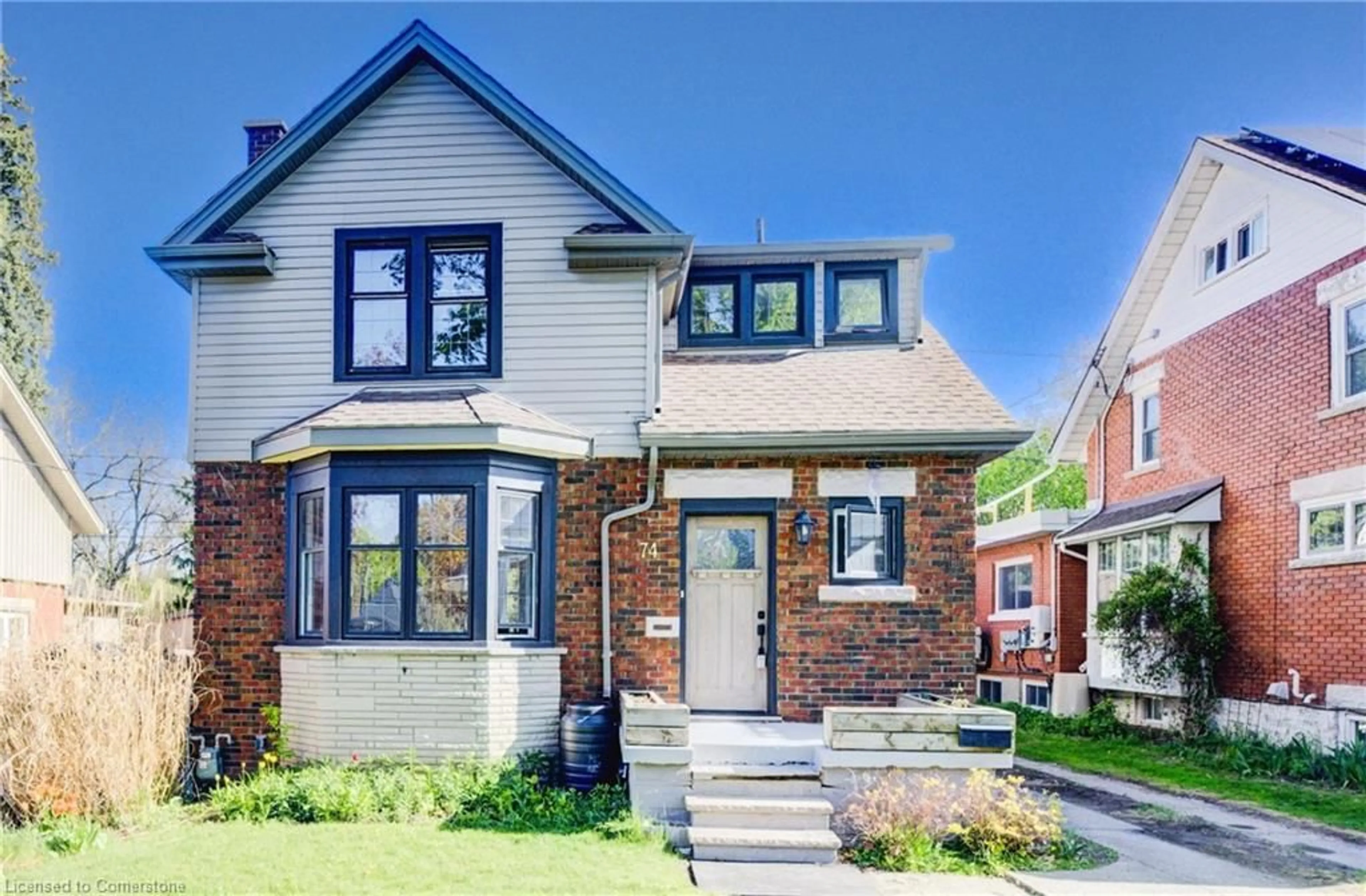 Home with brick exterior material, street for 74 Homewood Ave, Kitchener Ontario N2M 1W9