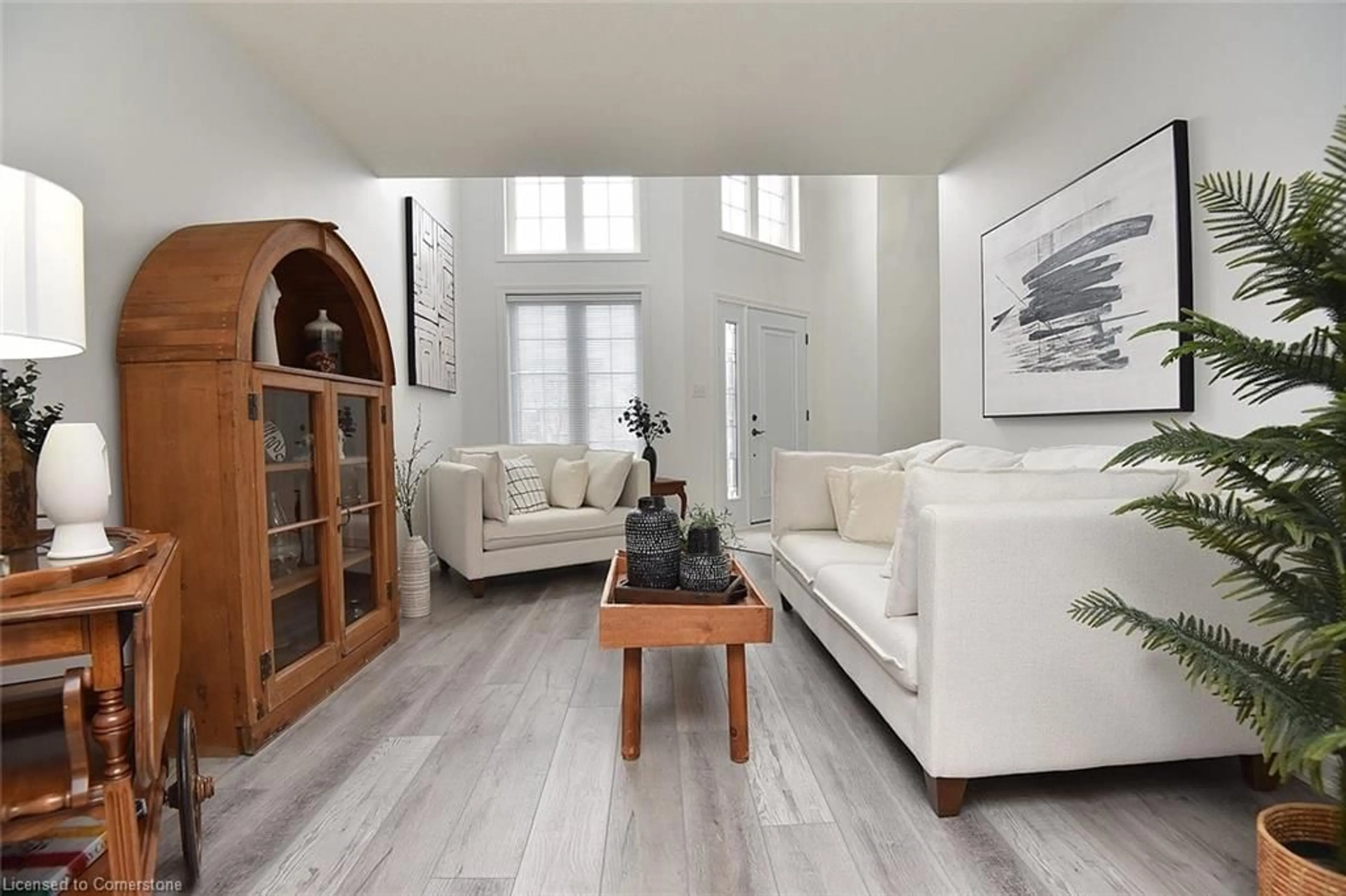 Living room with furniture, wood/laminate floor for 39 Duncan Ave, Waterdown Ontario L8B 0E1