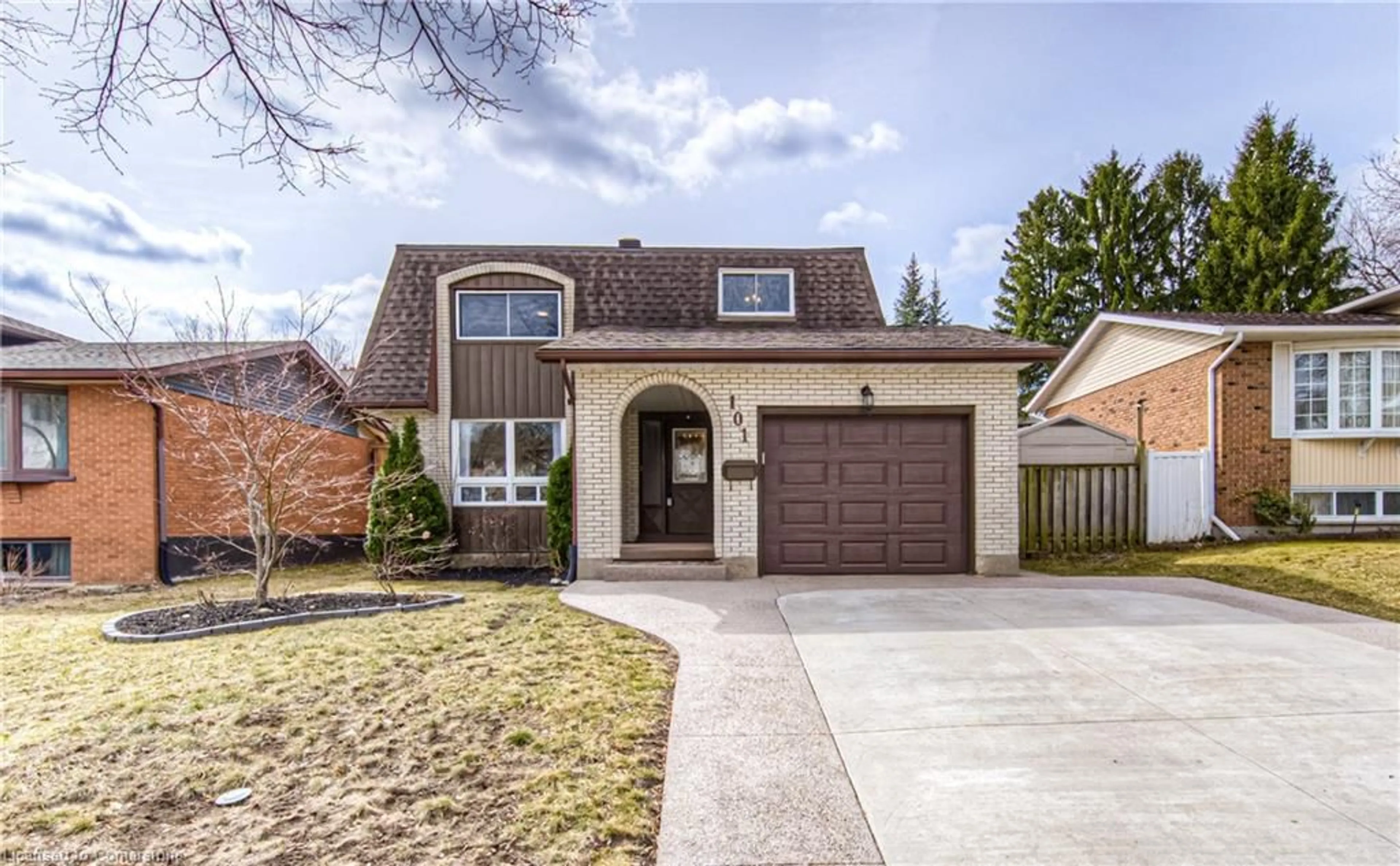 Home with brick exterior material, street for 101 Old Country Dr, Kitchener Ontario N2E 1S4
