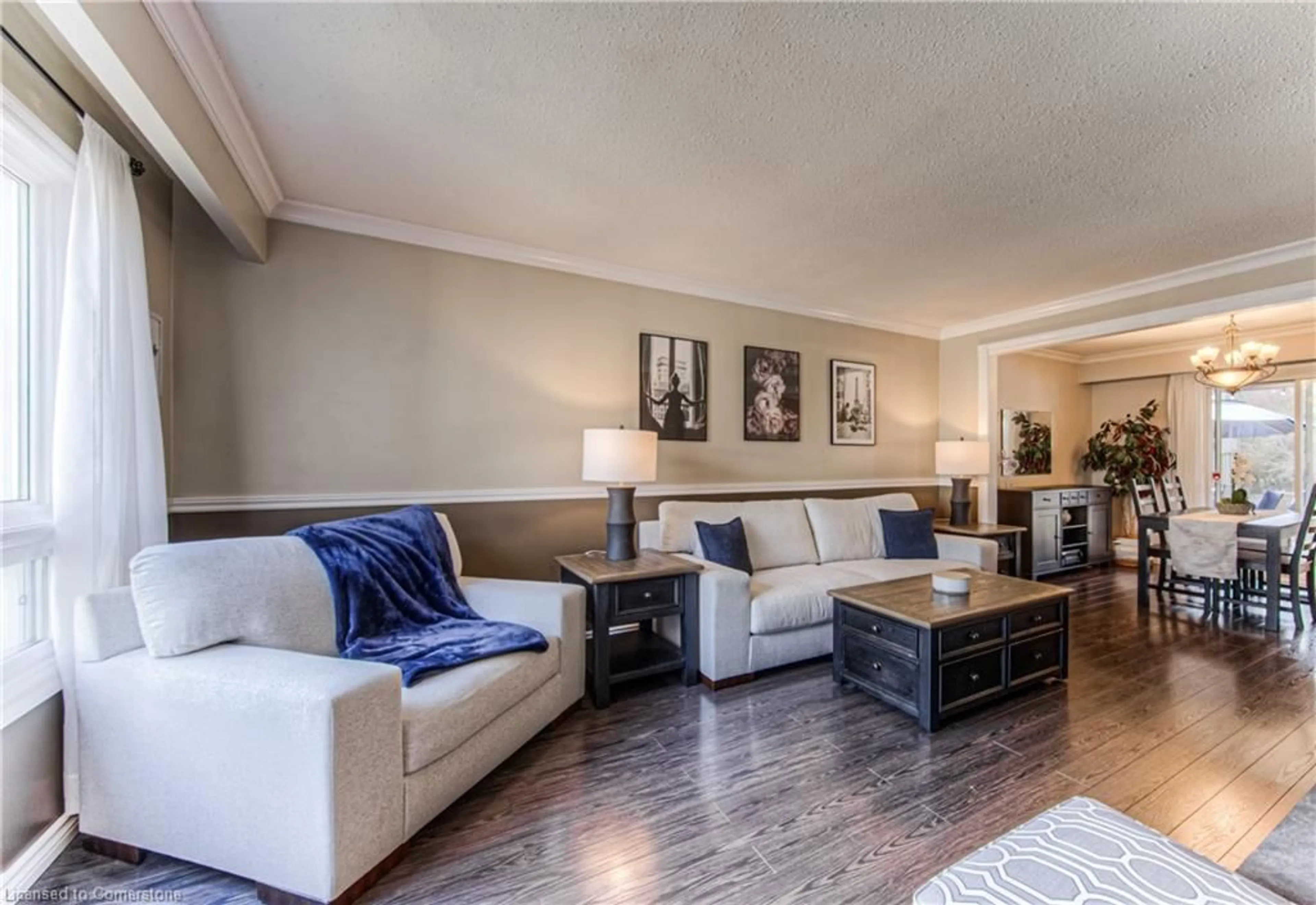 Living room with furniture, wood/laminate floor for 101 Old Country Dr, Kitchener Ontario N2E 1S4