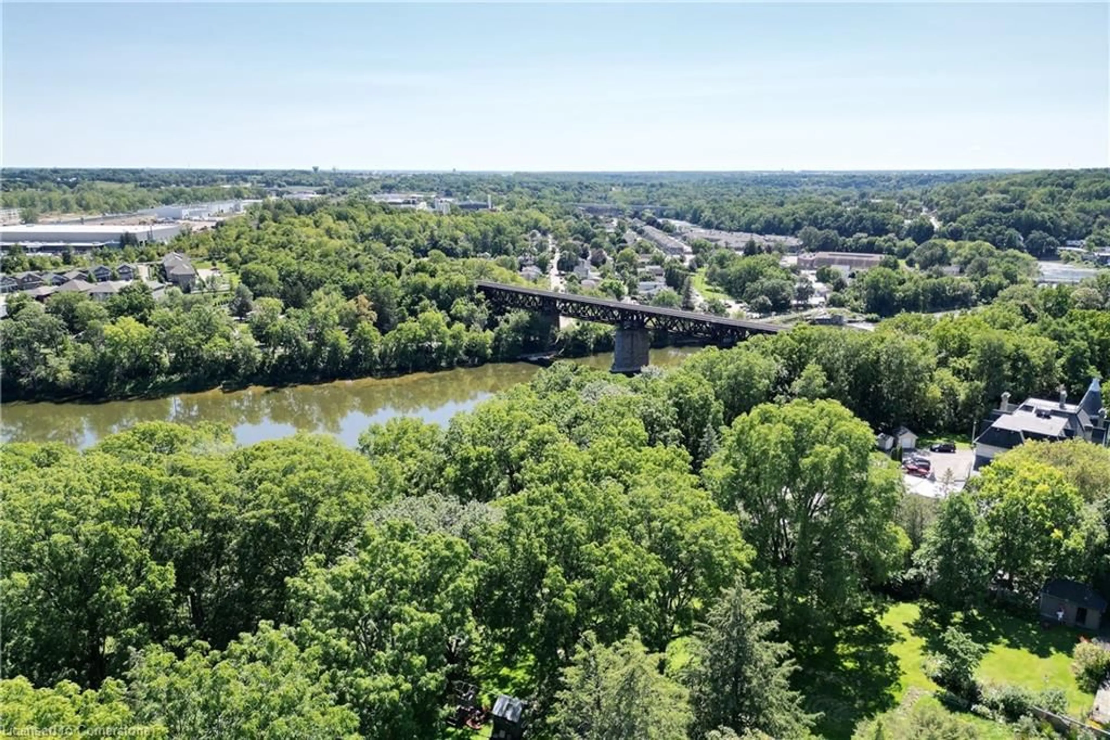 A pic from outside/outdoor area/front of a property/back of a property/a pic from drone, water/lake/river/ocean view for 199 Grand River St, Paris Ontario N3L 2N2