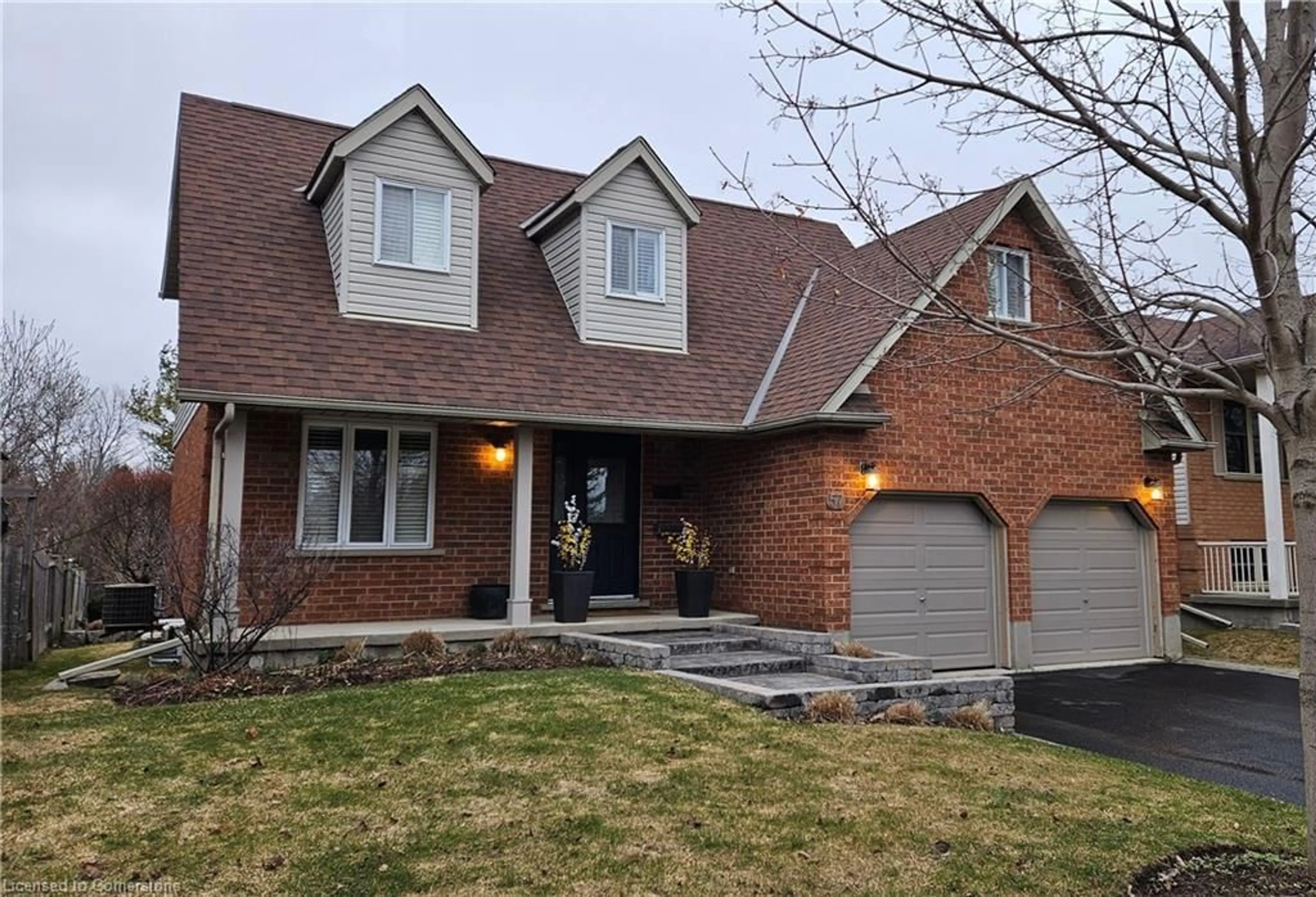 Home with brick exterior material, street for 57 Flaherty Dr, Guelph Ontario N1H 8K6
