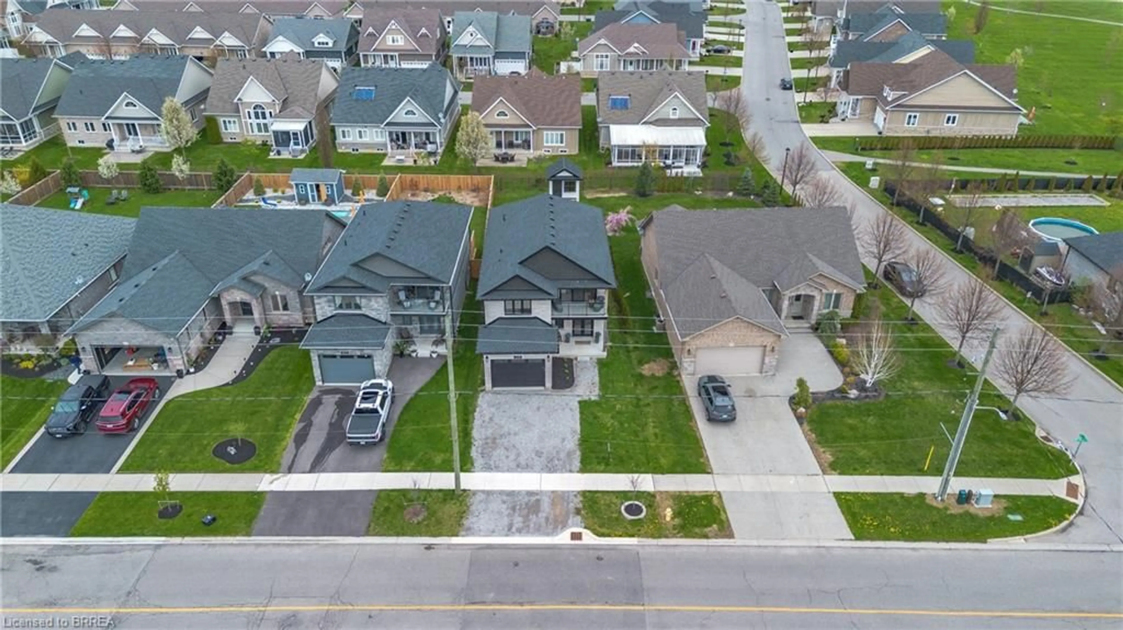 A pic from outside/outdoor area/front of a property/back of a property/a pic from drone, street for 145 New Lakeshore Rd, Port Dover Ontario N0A 1N3