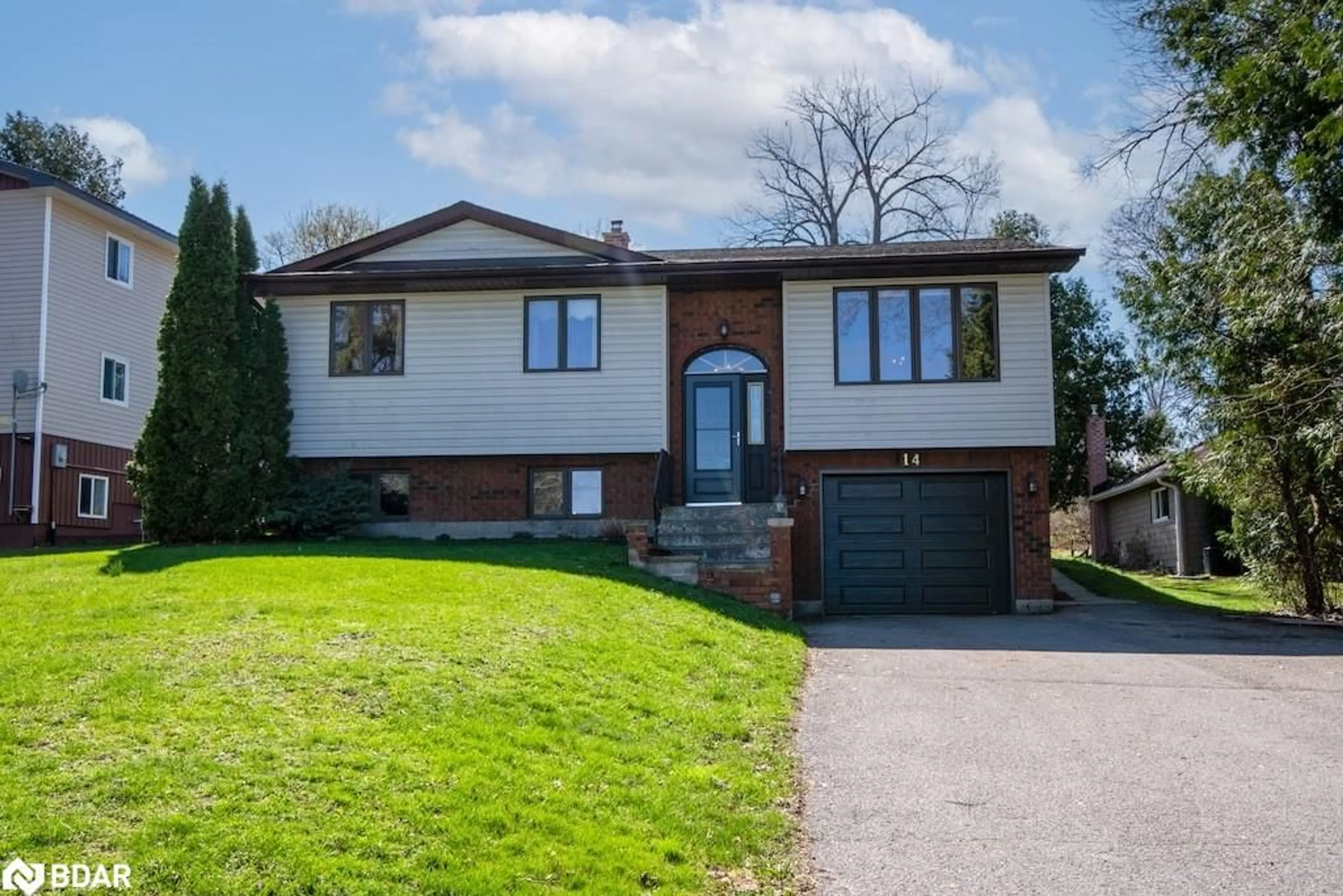 Home with brick exterior material, street for 14 Mcgill Dr, Kawartha Lakes Ontario L0B 1K0