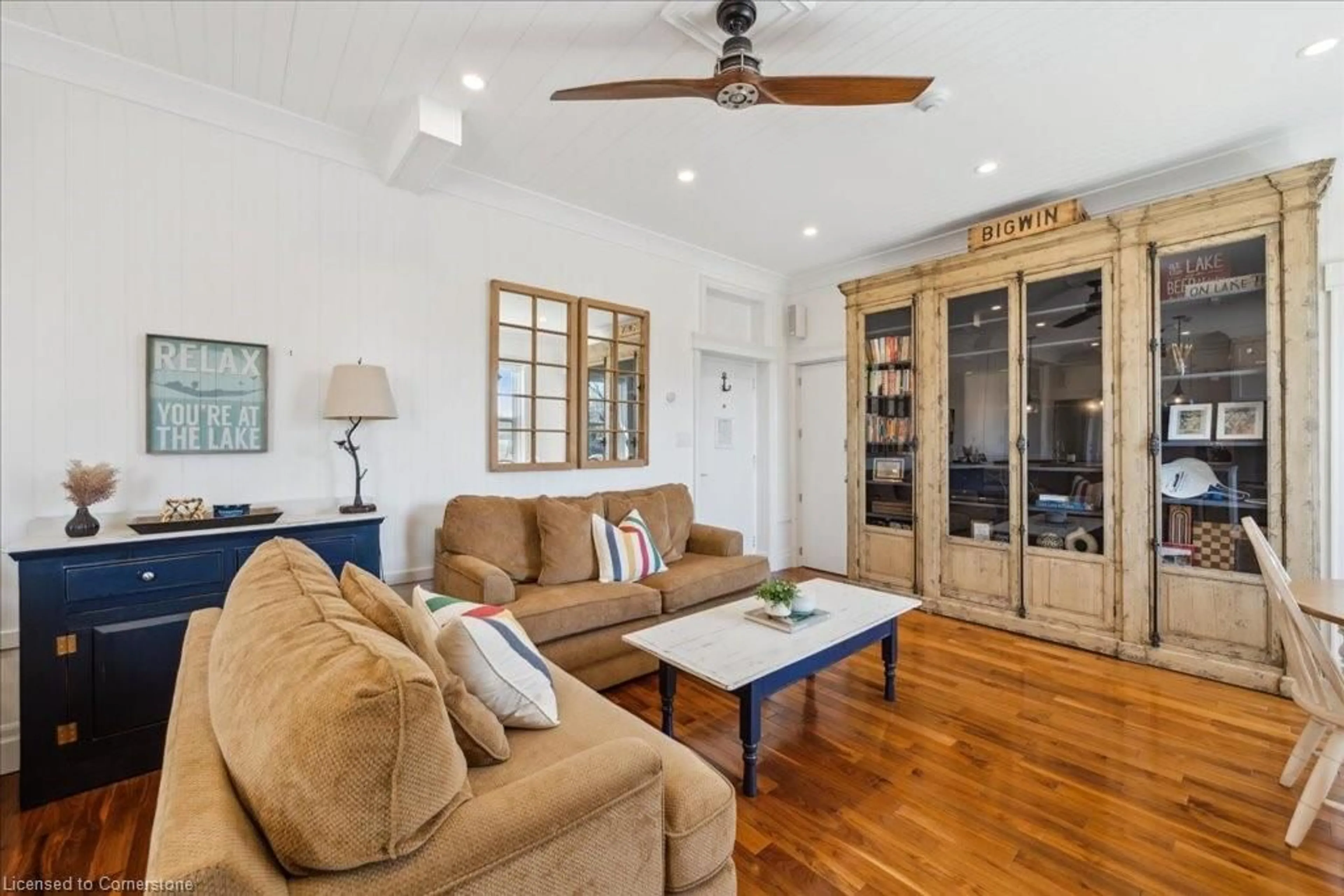 Living room with furniture, wood/laminate floor for 12 Bigwin Island Rd #202/206, Lake Of Bays Ontario P0B 1A0