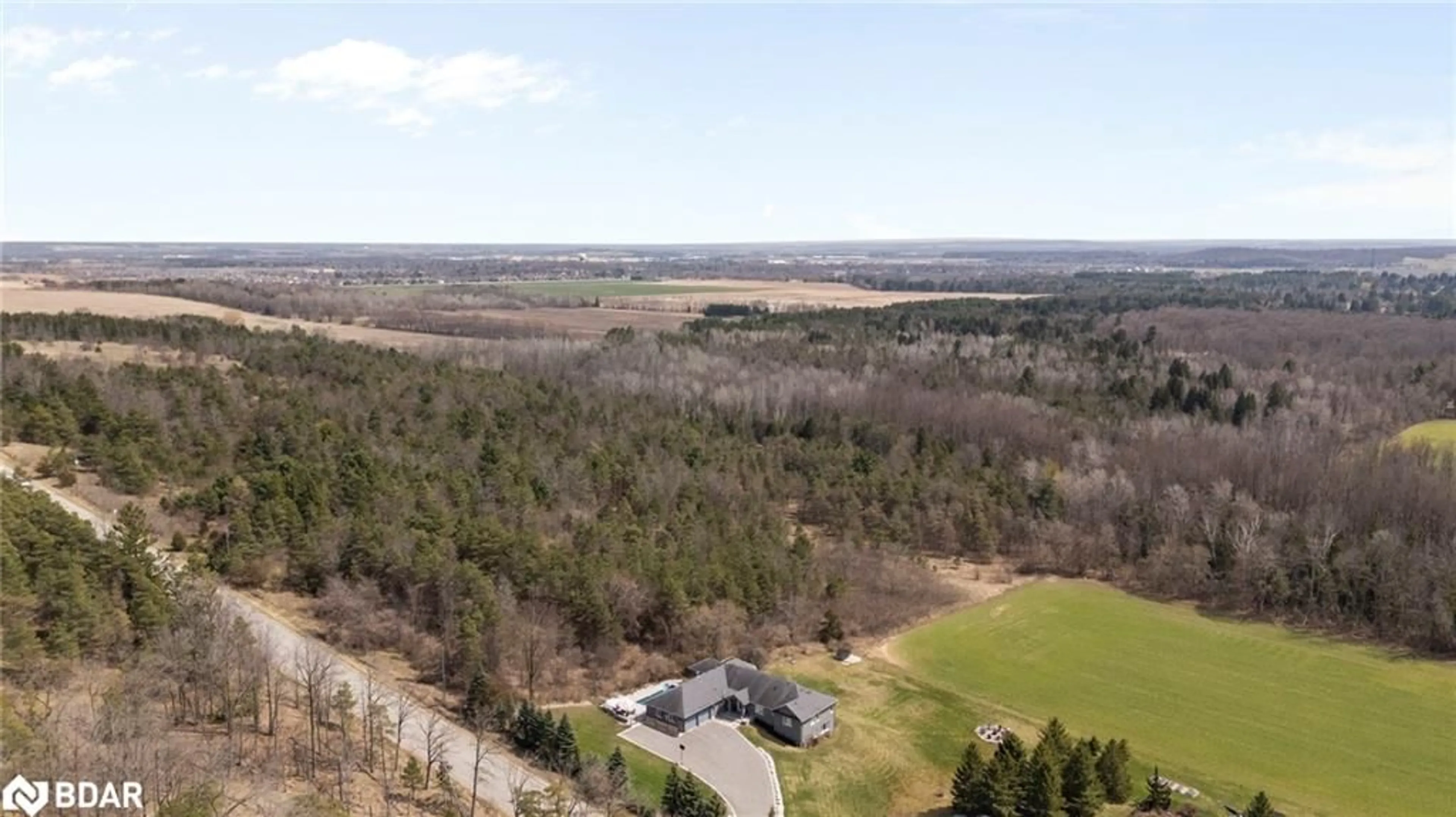 A pic from outside/outdoor area/front of a property/back of a property/a pic from drone, forest/trees view for 7765 5th Sideroad Tos, Adjala-Tosorontio Ontario L9R 1V3