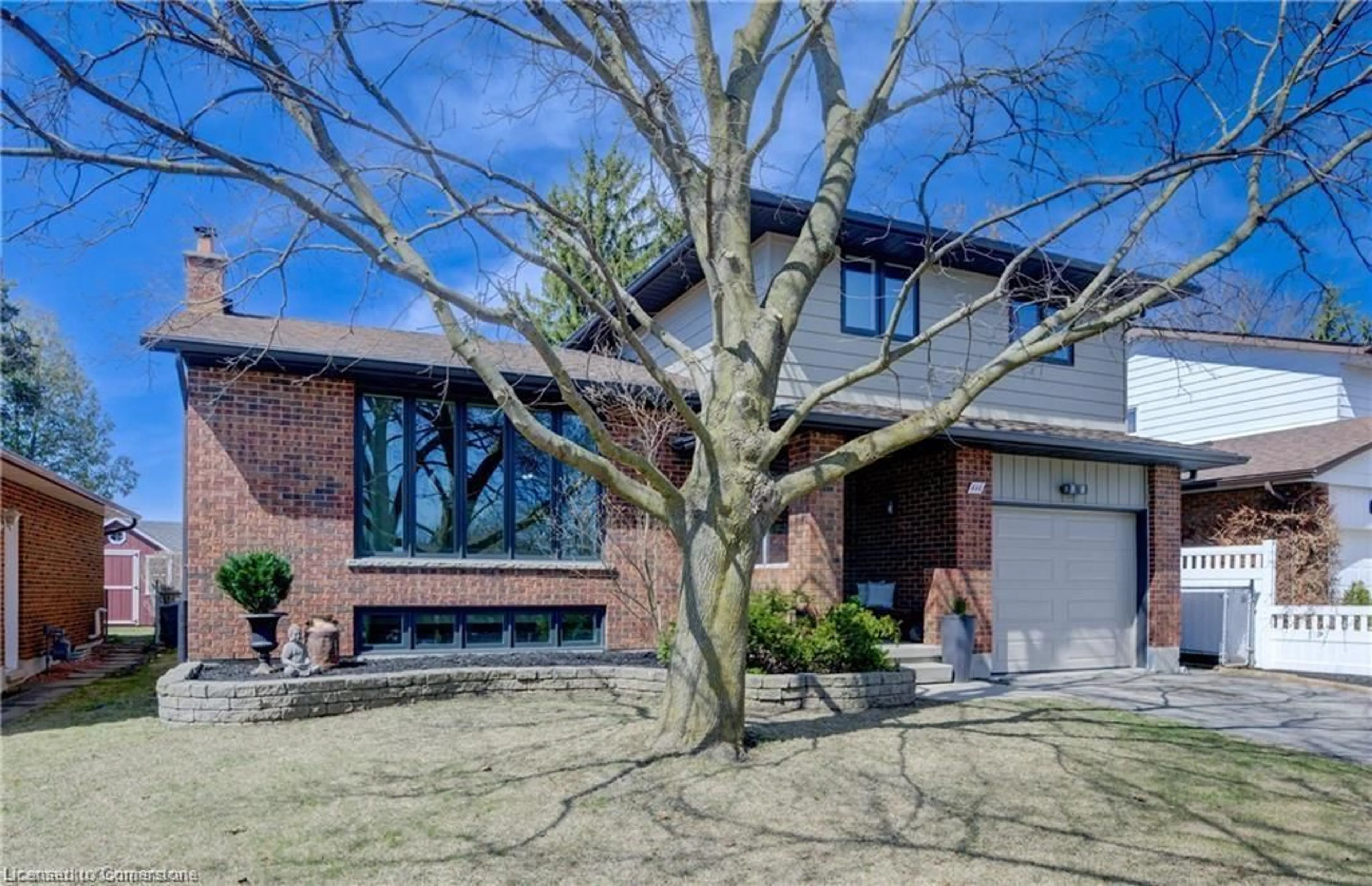 Home with brick exterior material, street for 111 Georgian Cres, Kitchener Ontario N2B 3N8
