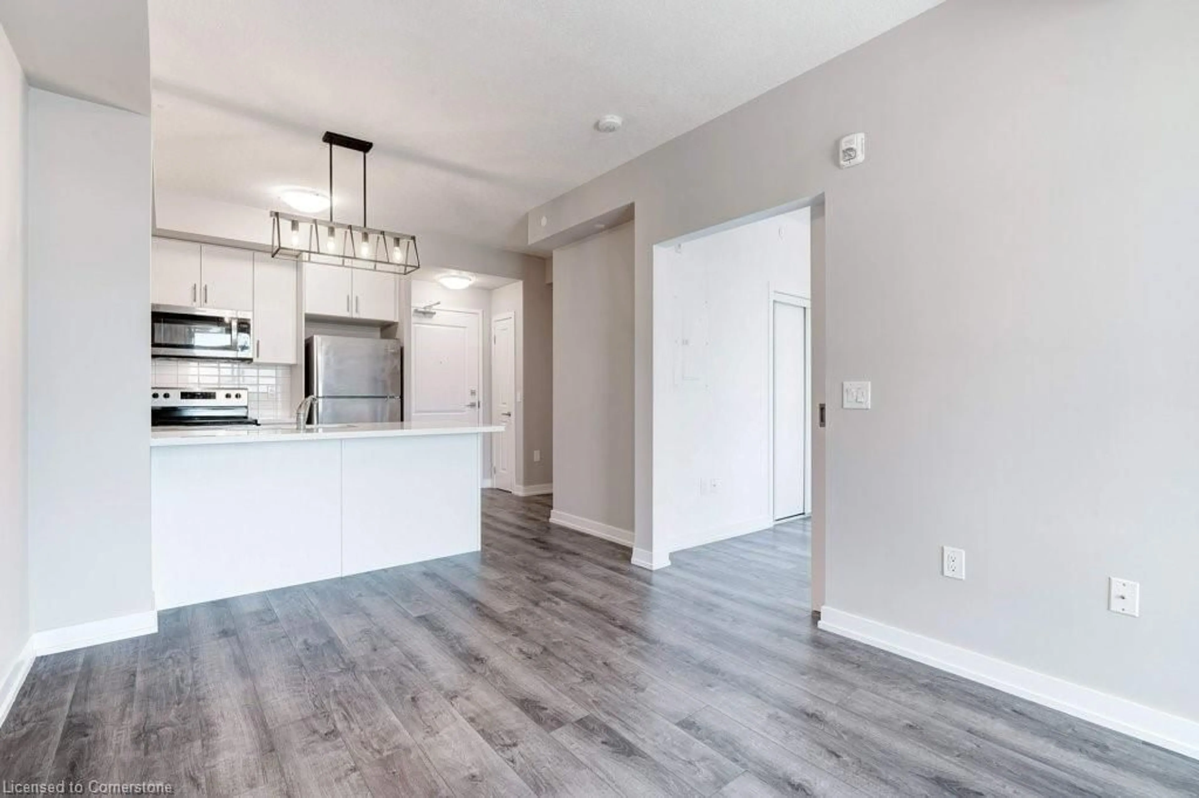 Open concept kitchen, wood/laminate floor for 5055 Greenlane Rd #430, Beamsville Ontario L0R 1B3