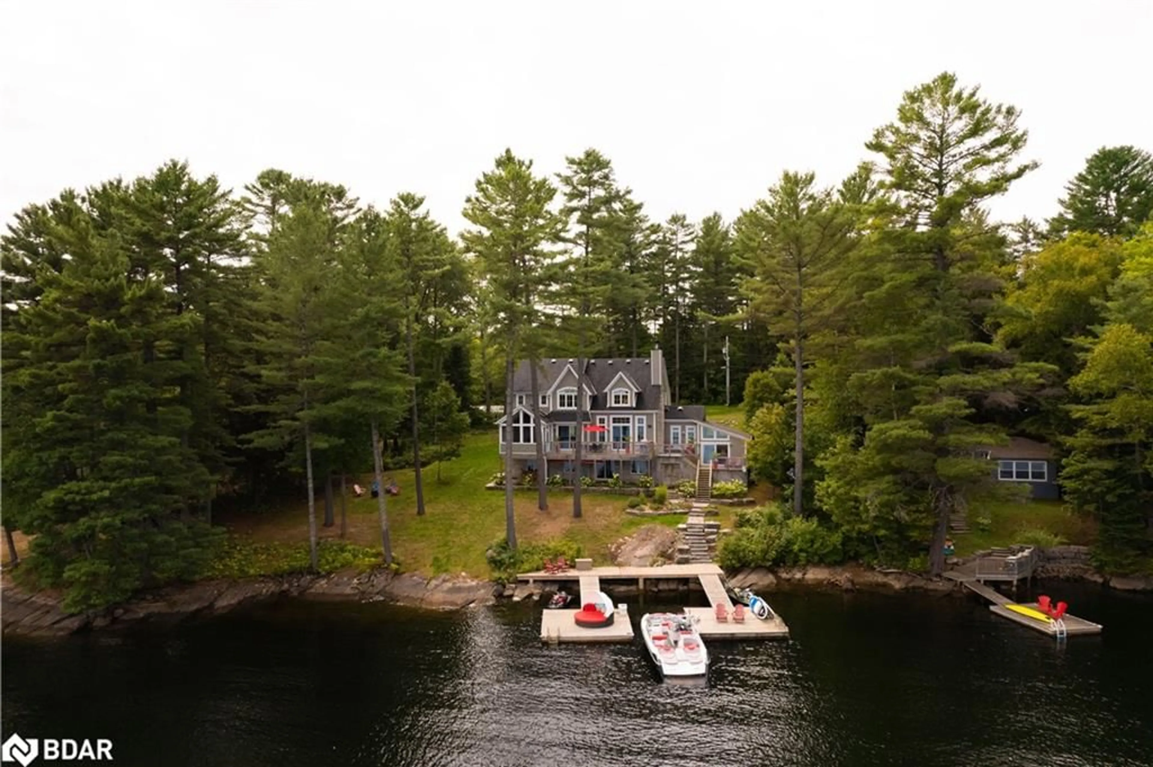 A pic from outside/outdoor area/front of a property/back of a property/a pic from drone, water/lake/river/ocean view for 1043 Fortunes Trail, Stanhope Ontario K0M 1S0