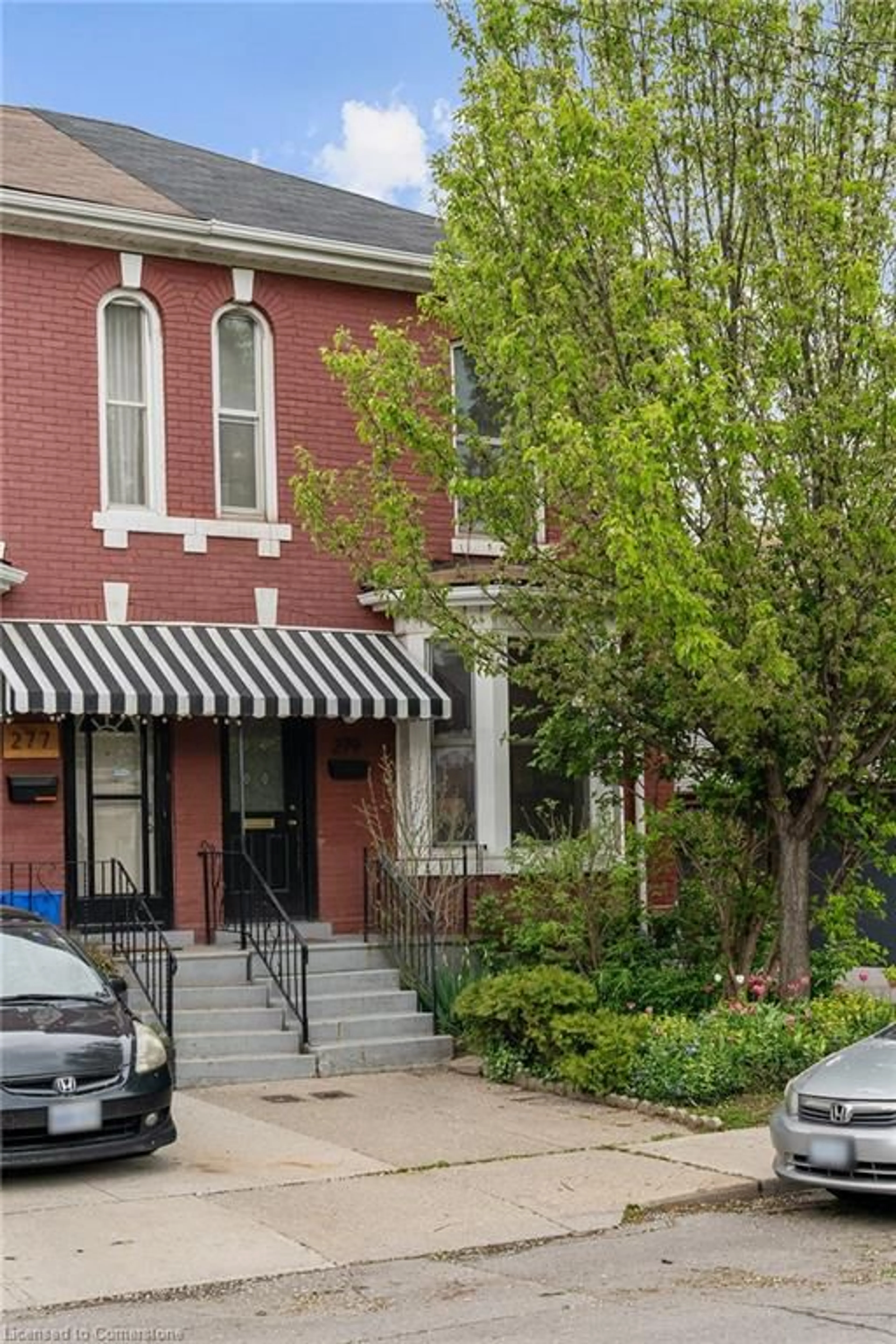 Home with brick exterior material, street for 279 Robert St, Hamilton Ontario L8L 2R5