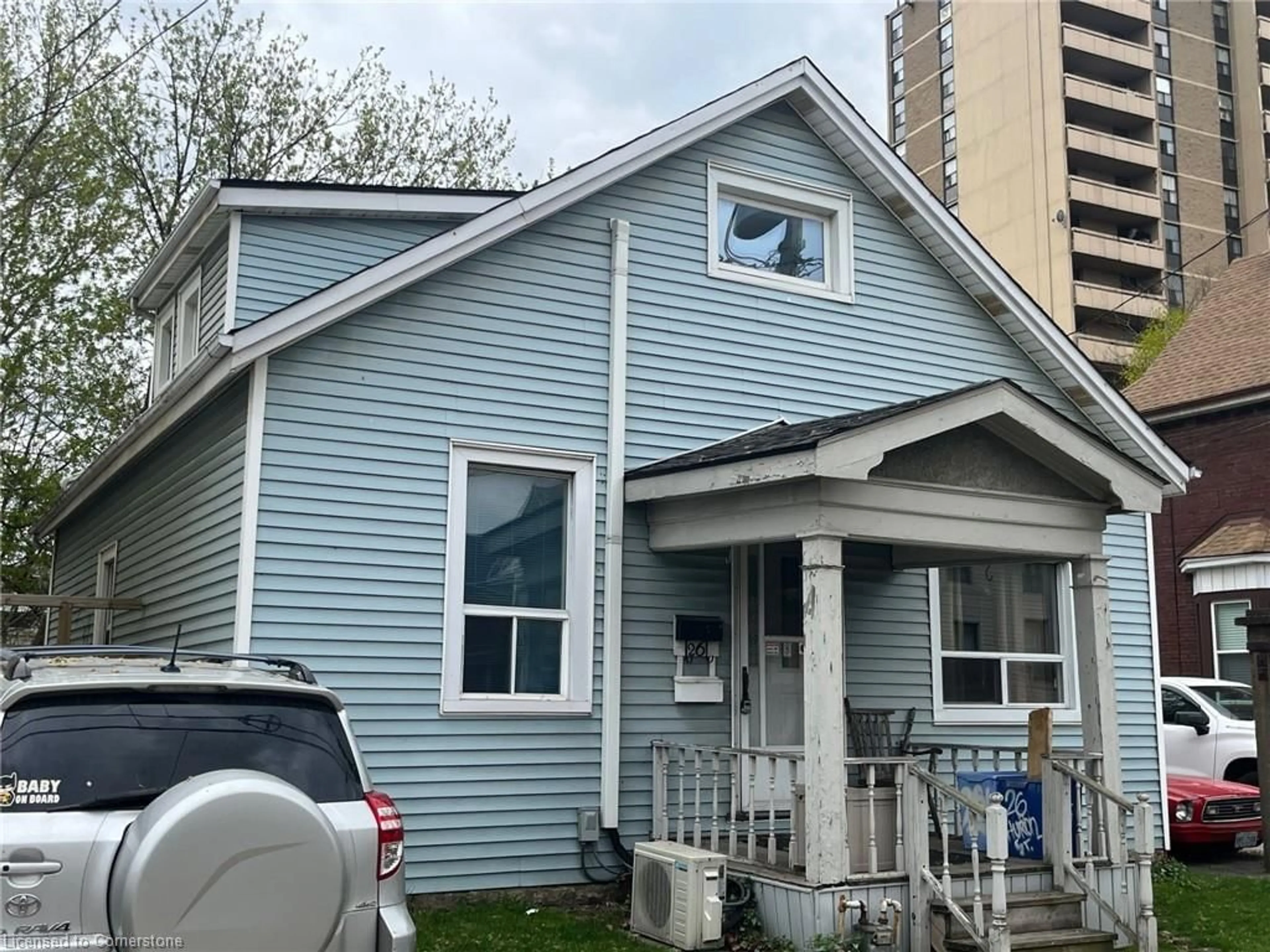 Home with vinyl exterior material, street for 26 Huron St, Hamilton Ontario L8L 2S2