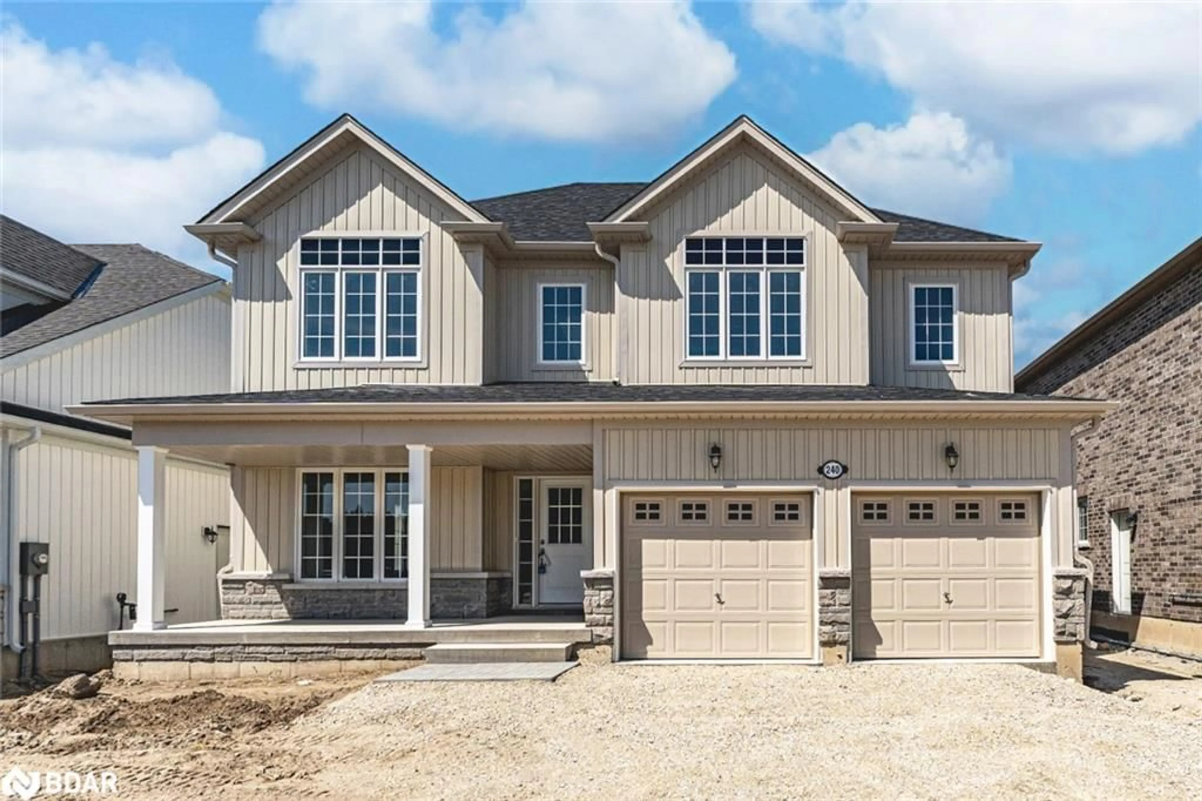 Home with vinyl exterior material, street for 240 Springfield Cres, Stayner Ontario L0M 1S0