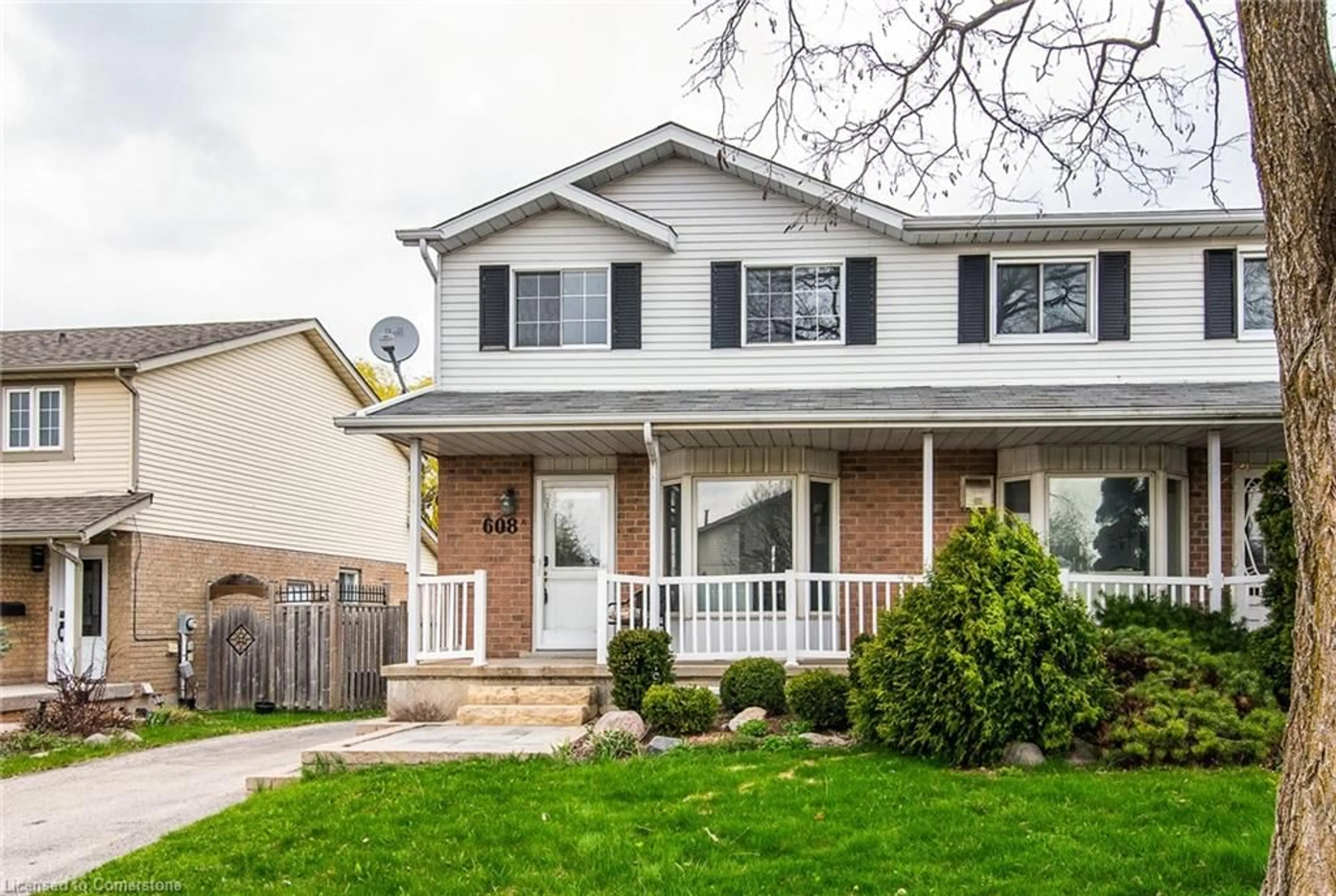 Home with vinyl exterior material, street for 608 Royal Beech Dr #A, Waterloo Ontario N2T 2K3