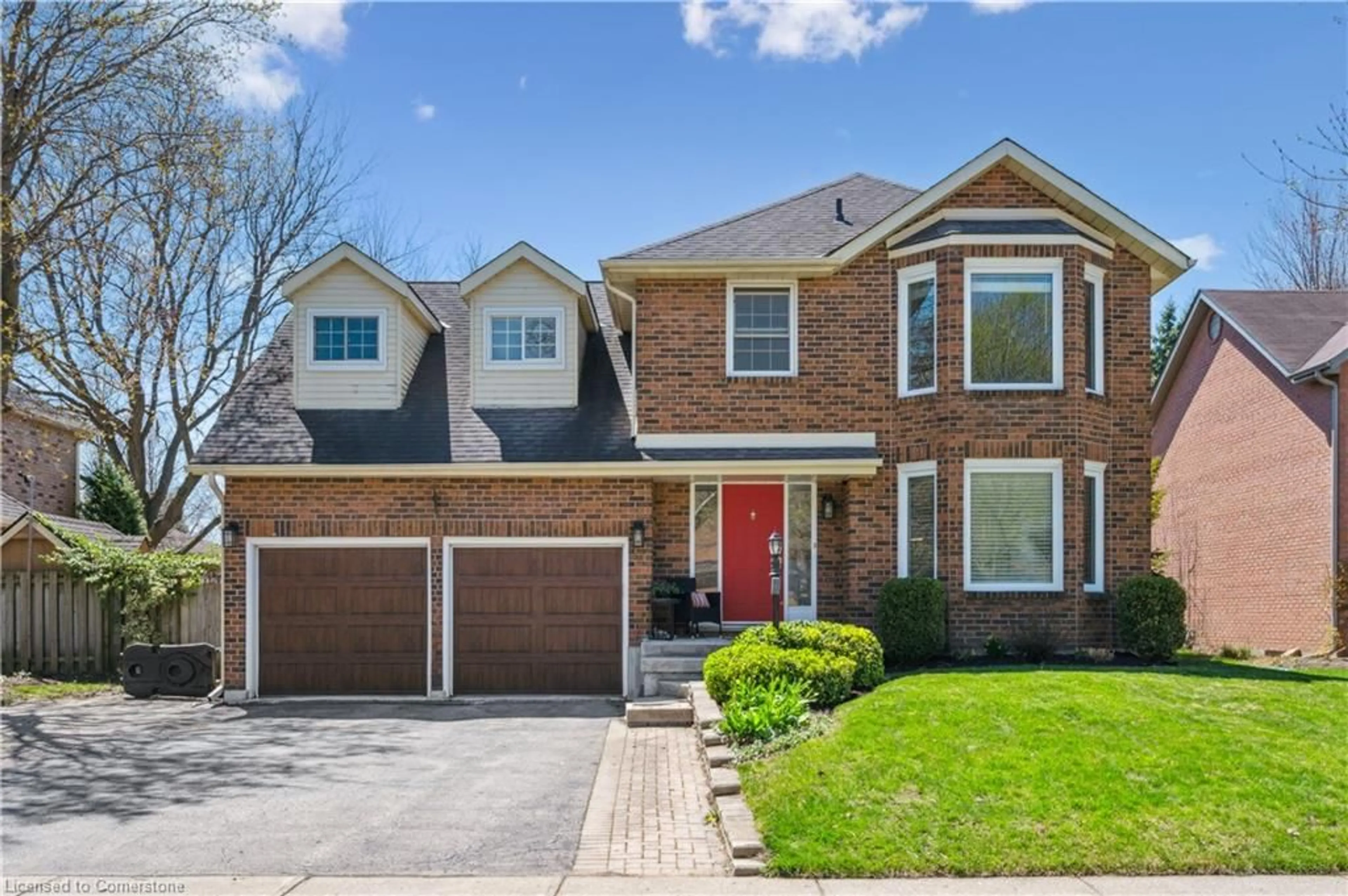 Home with brick exterior material, street for 591 Deer Run Dr, Waterloo Ontario N2K 3H7