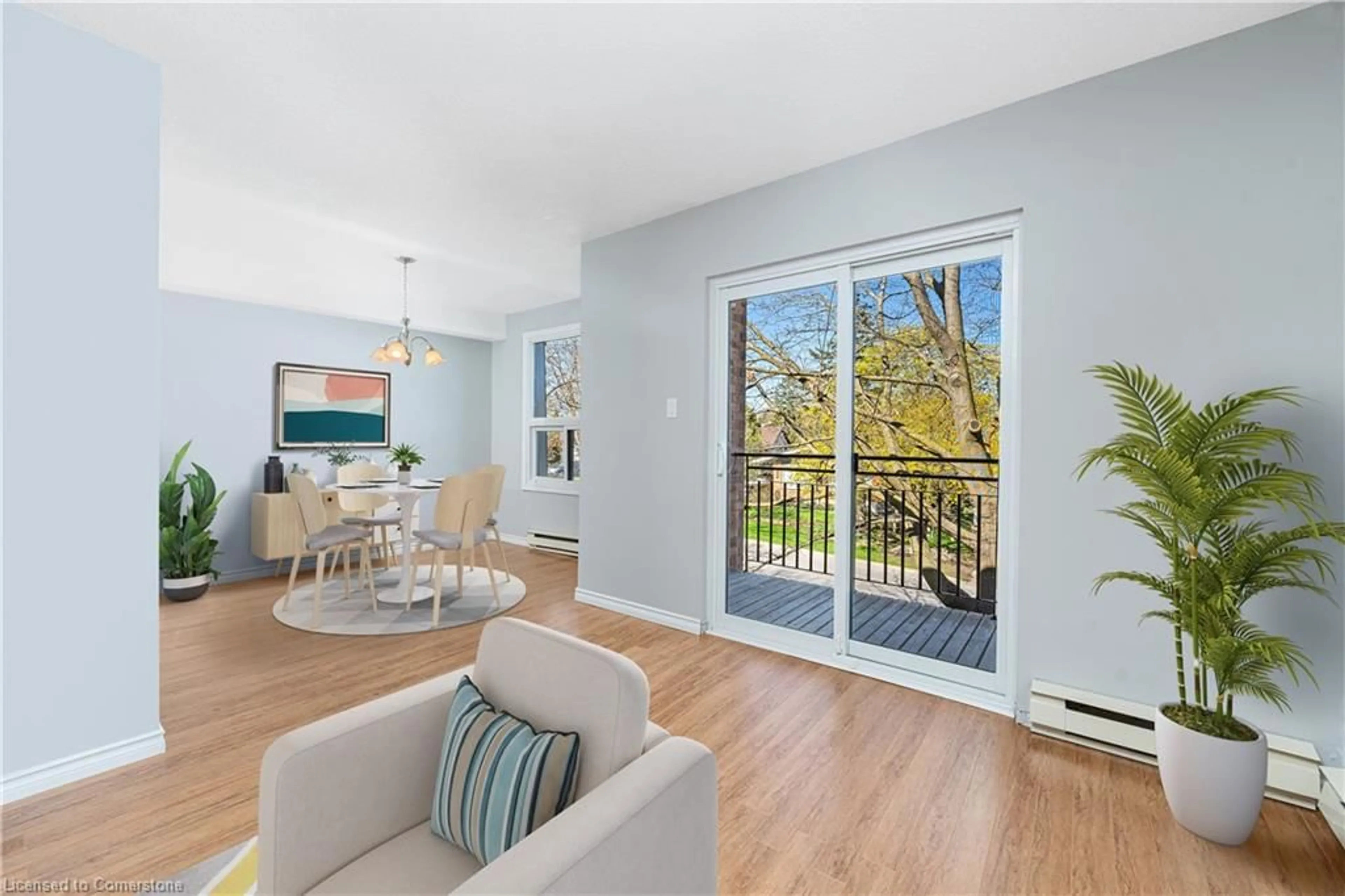 Living room with furniture, wood/laminate floor for 4209 Hixon St #202, Beamsville Ontario L3J 0K2