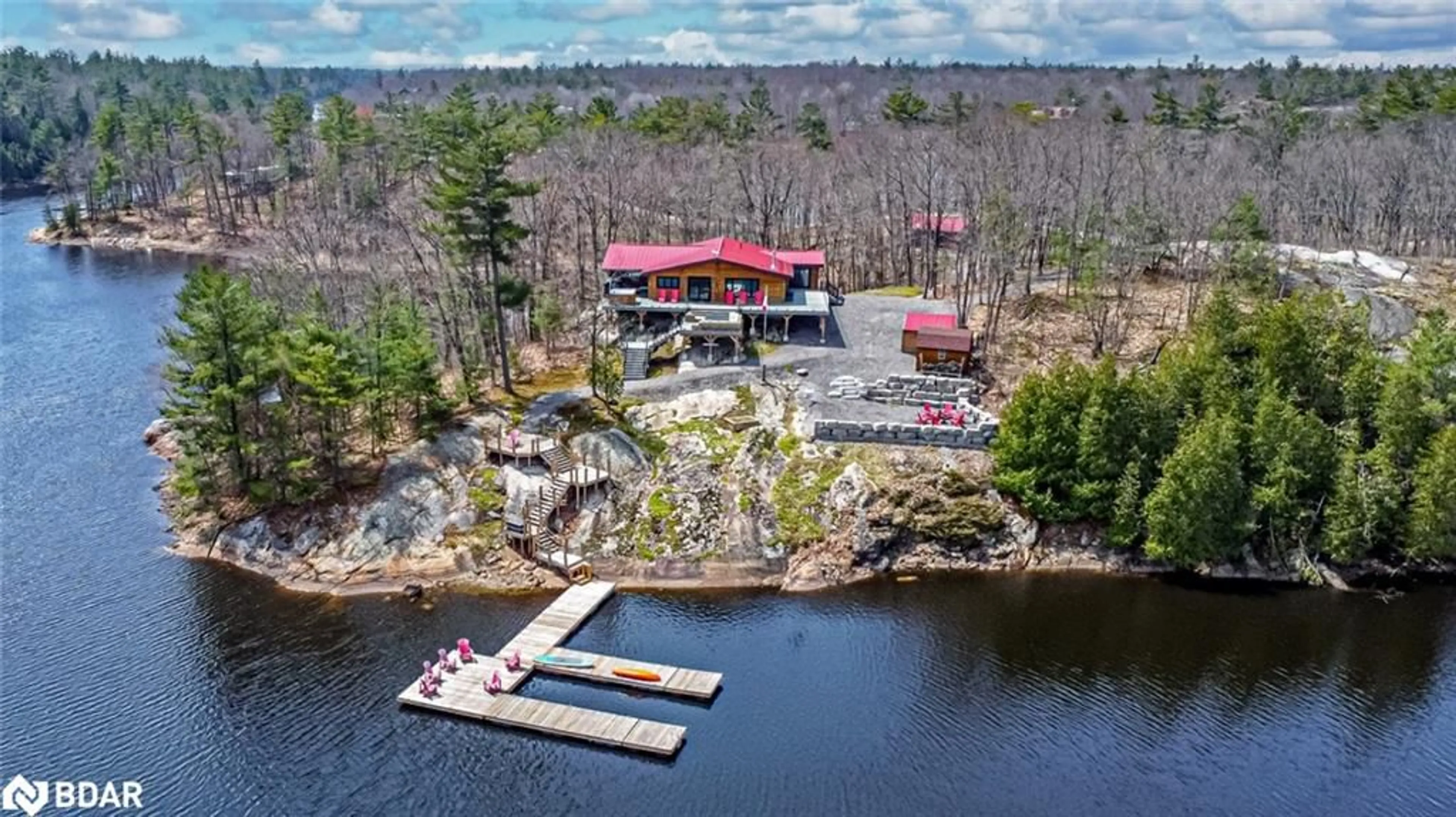 A pic from outside/outdoor area/front of a property/back of a property/a pic from drone, water/lake/river/ocean view for 83 Walkway Rd, Georgian Bay Twp Ontario L0K 1S0