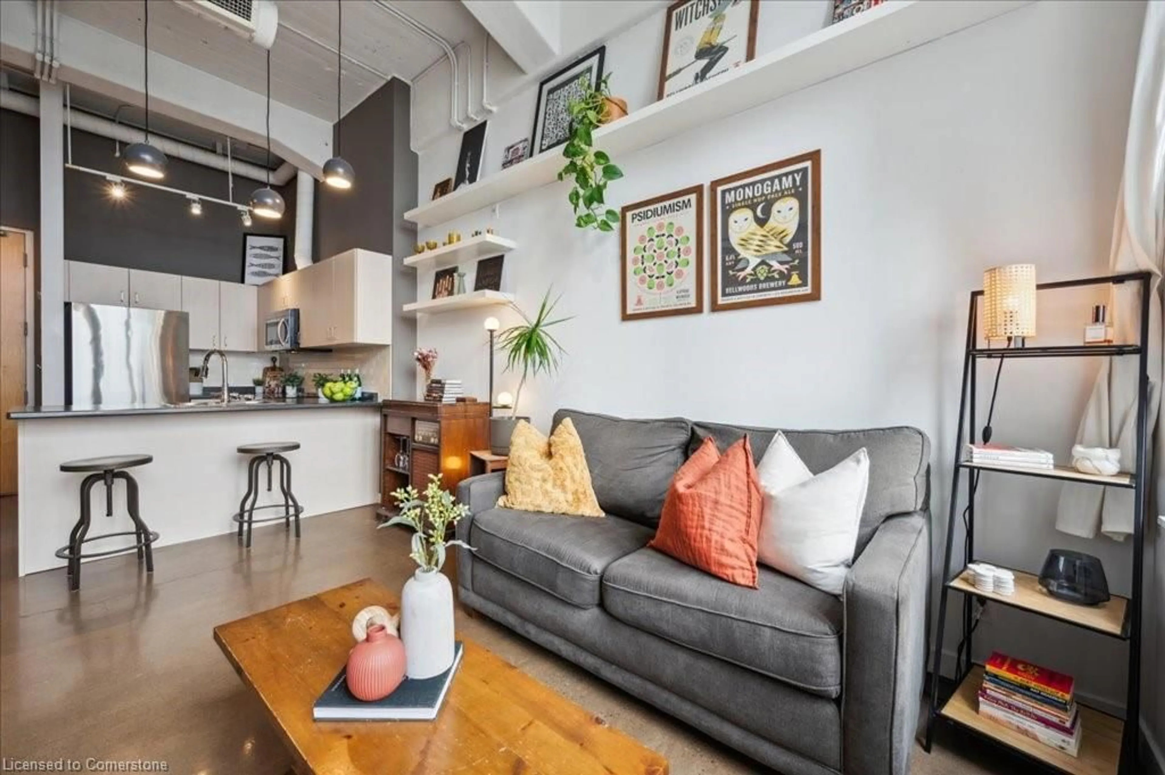 Living room with furniture, cement floor for 404 King St #205, Kitchener Ontario N2G 2L5