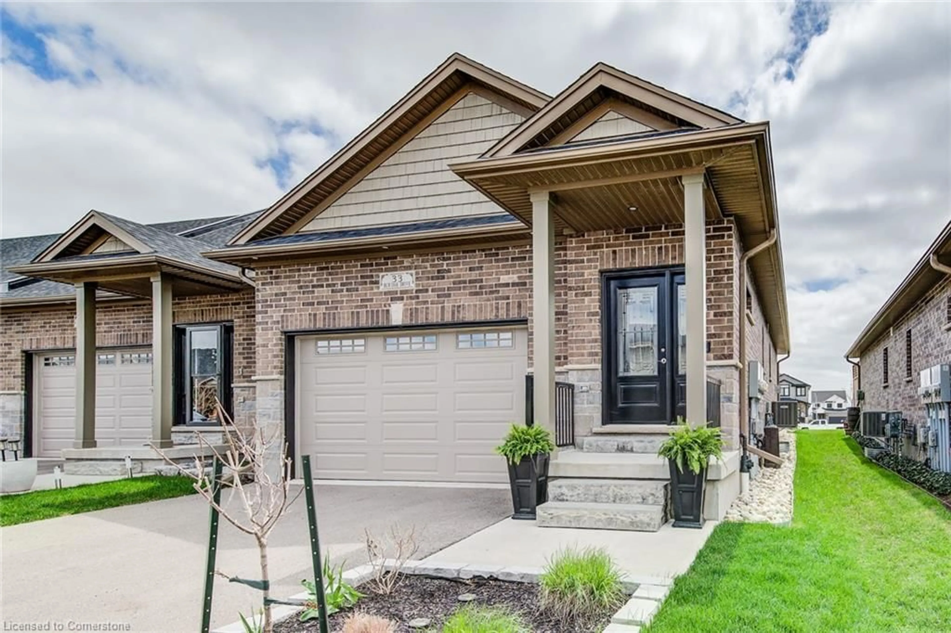 Home with brick exterior material, street for 33 Bur Oak Dr, Elmira Ontario N3B 0C6