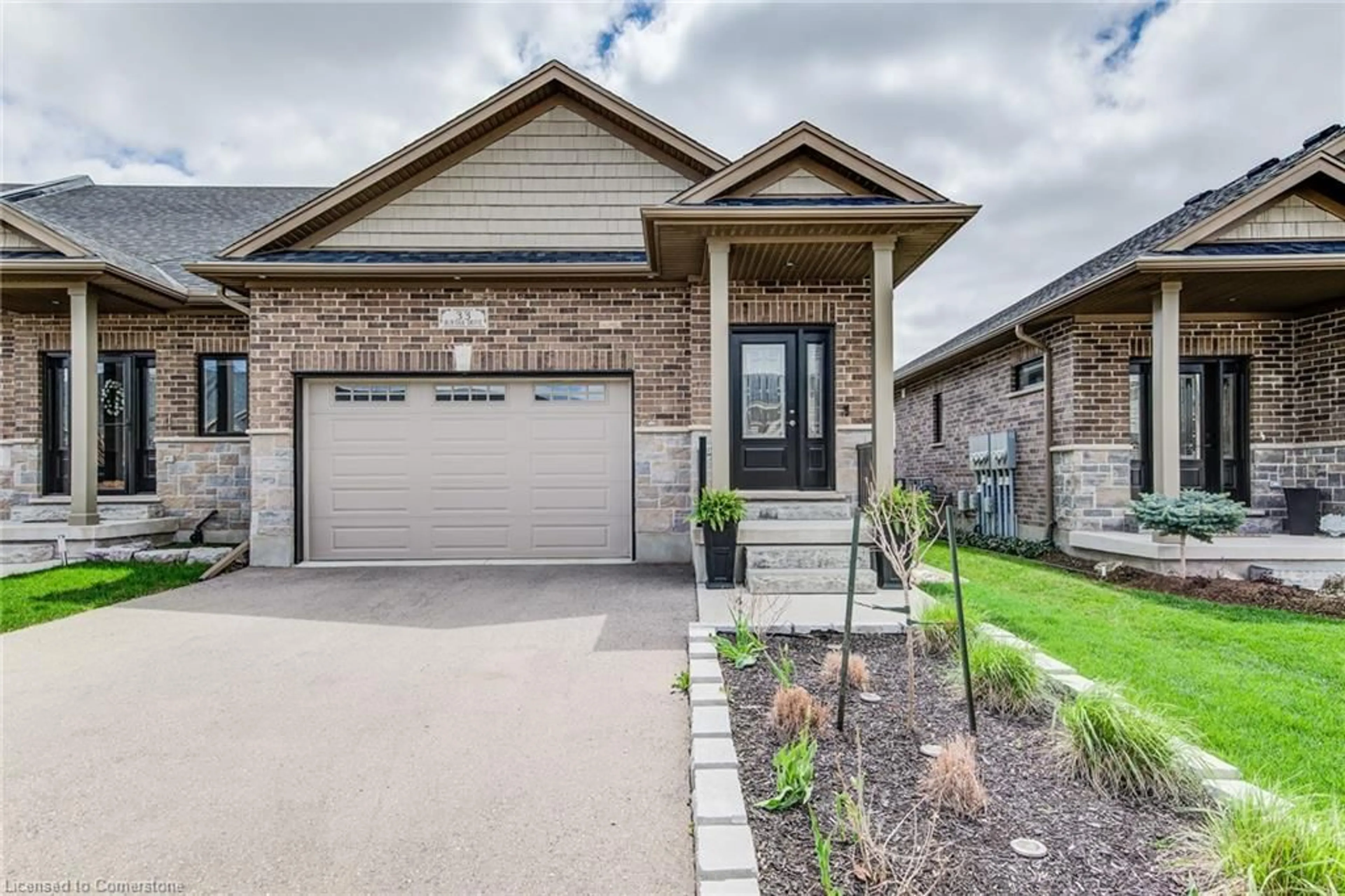 Home with brick exterior material, street for 33 Bur Oak Dr, Elmira Ontario N3B 0C6