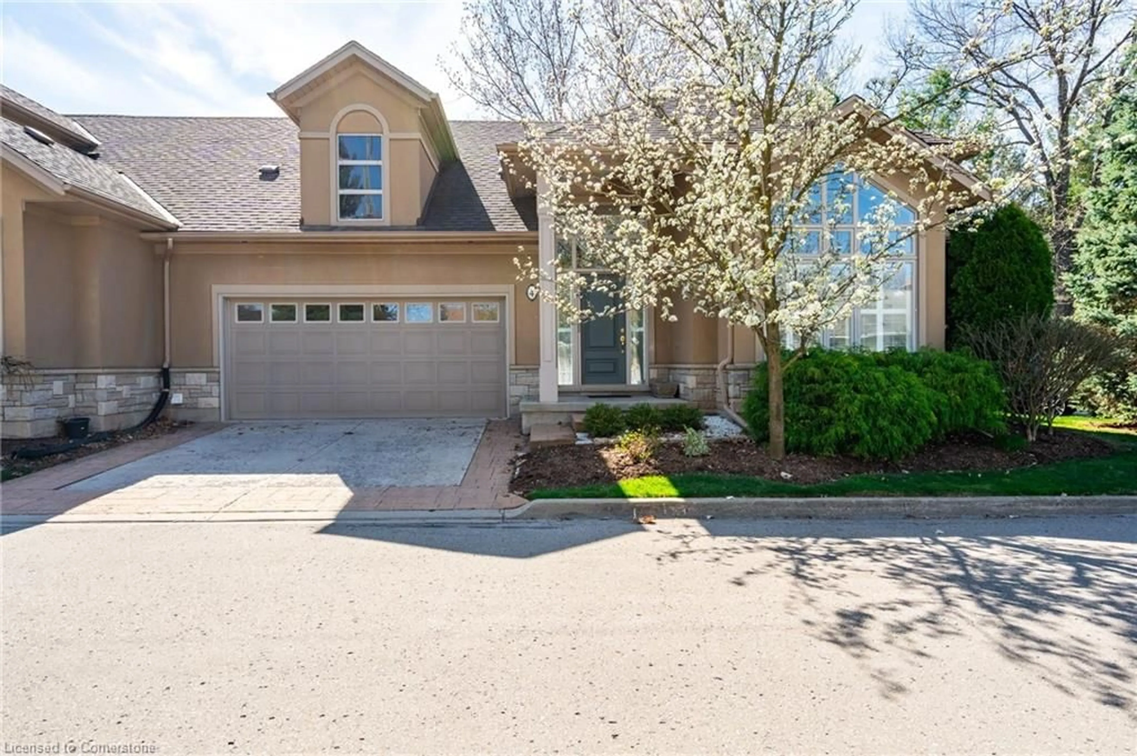 Home with brick exterior material, street for 165 Glendale Avenue #4, St. Catharines Ontario L2T 2K2