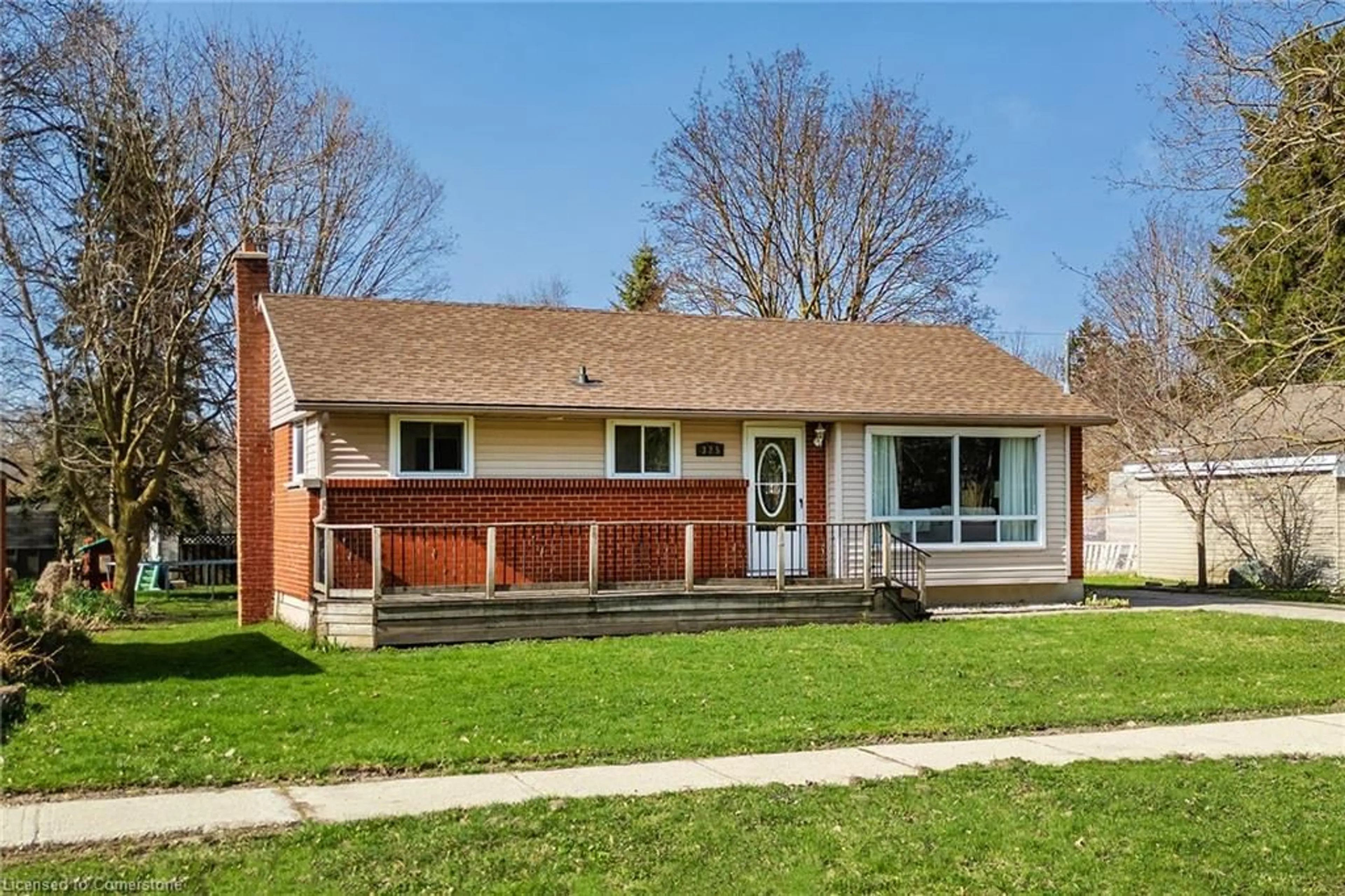 Home with vinyl exterior material, street for 325 Boulton St, Palmerston Ontario N0G 2P0