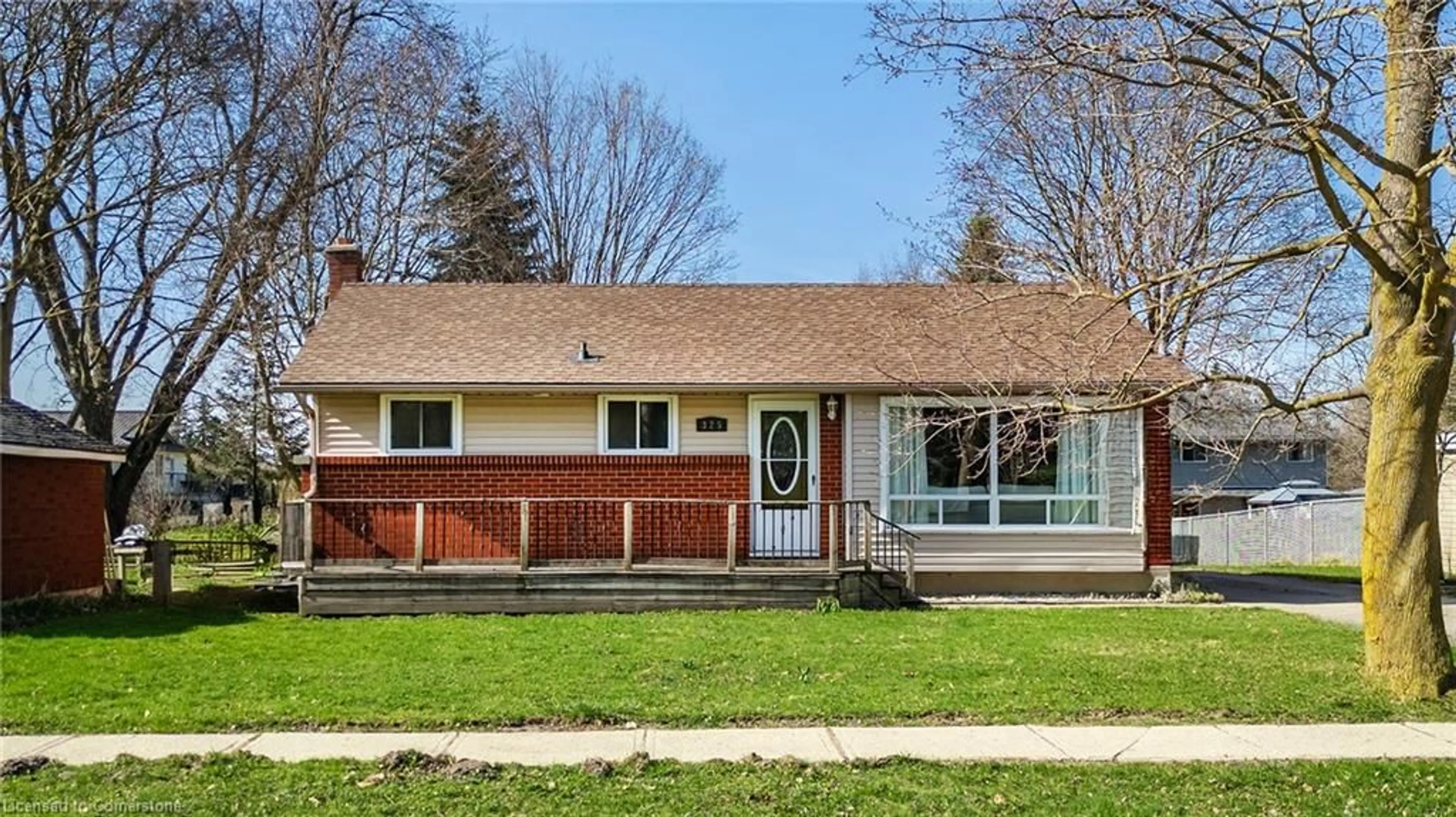 Home with vinyl exterior material, street for 325 Boulton St, Palmerston Ontario N0G 2P0