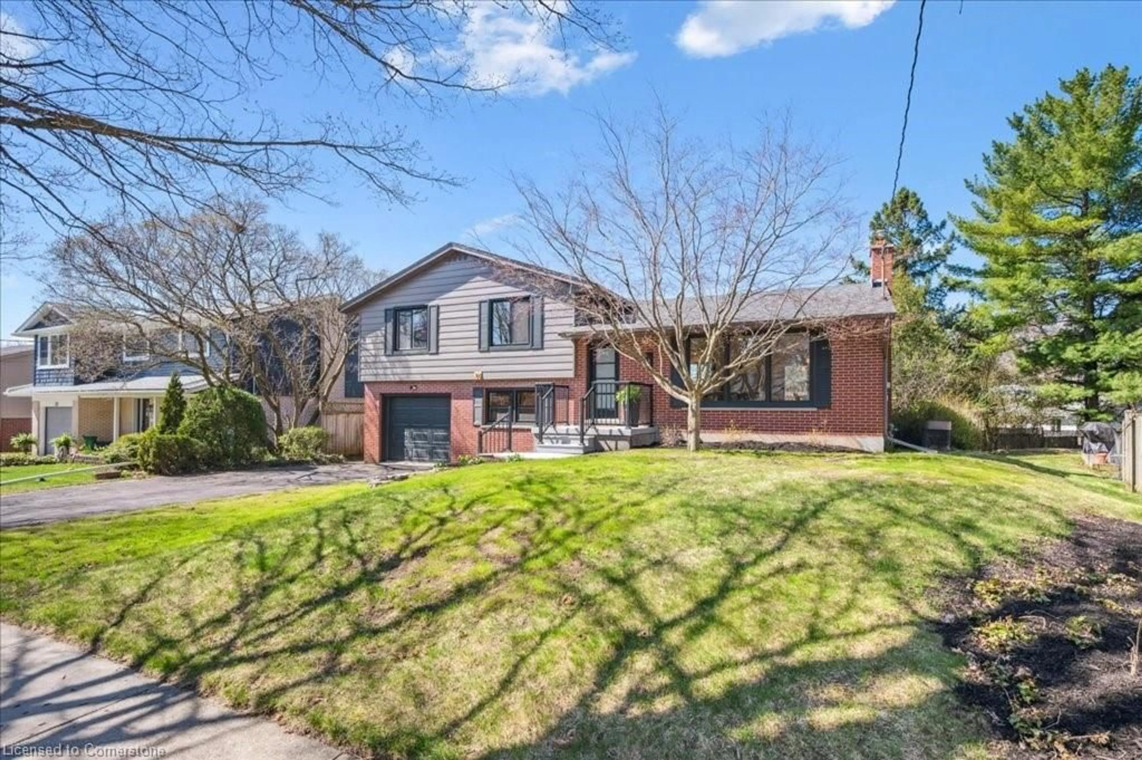 Home with brick exterior material, street for 39 Thornridge Cres, Kitchener Ontario N2M 4V9