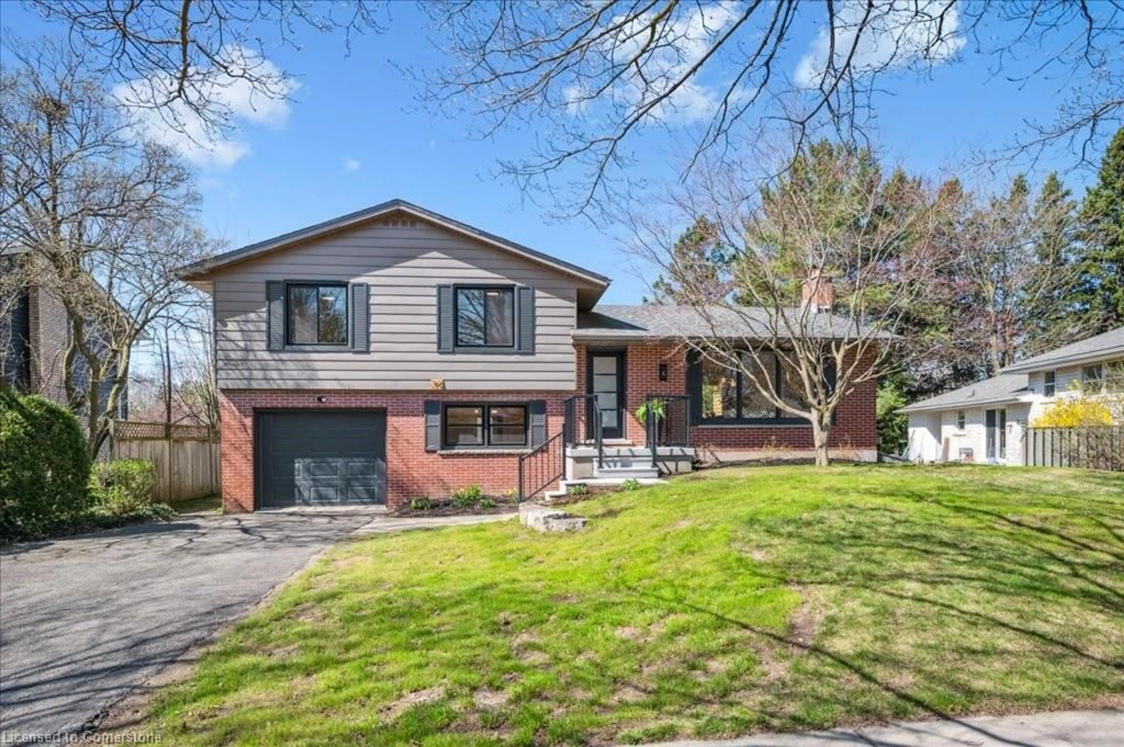Home with brick exterior material, street for 39 Thornridge Cres, Kitchener Ontario N2M 4V9