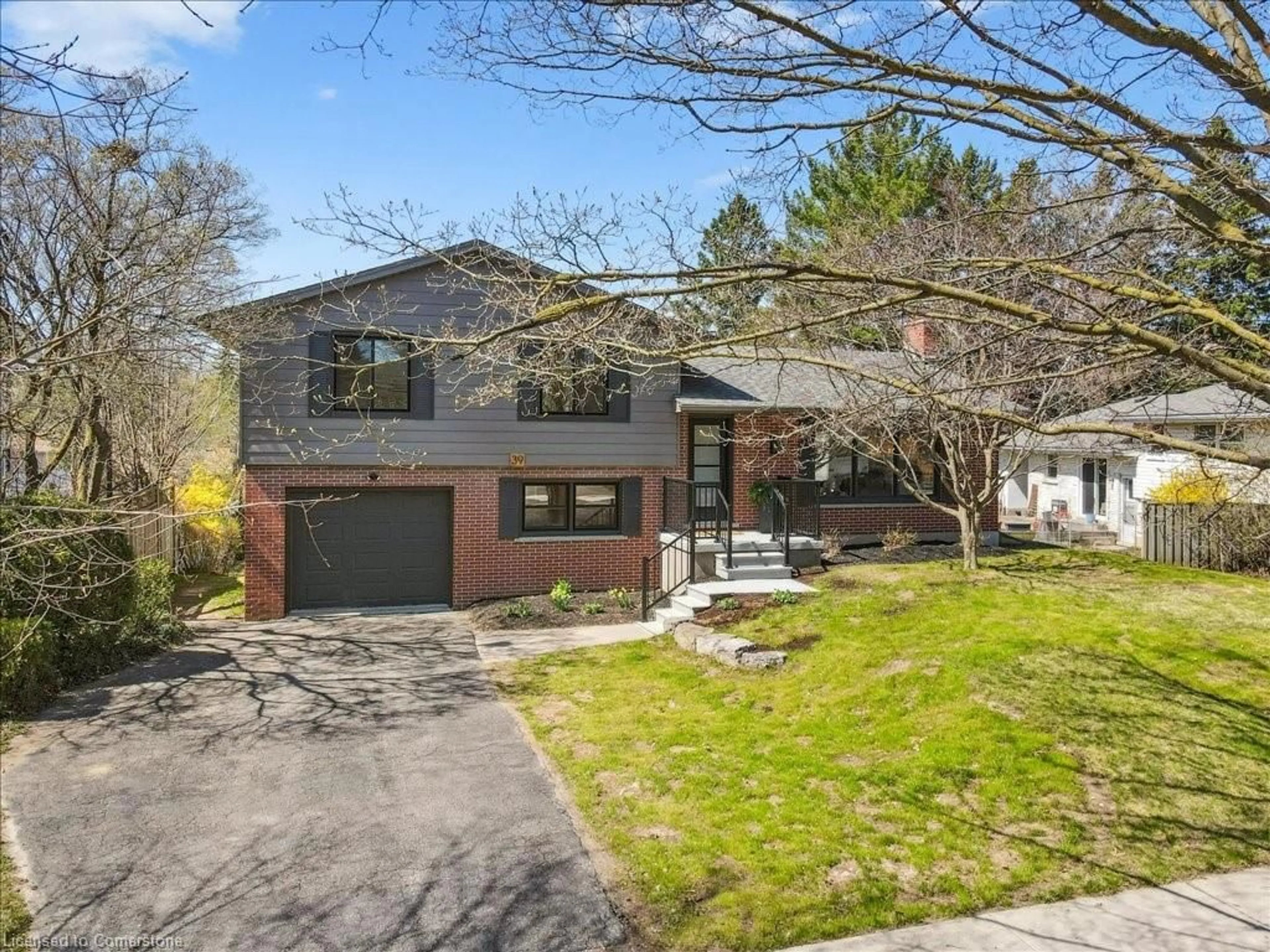Home with brick exterior material, street for 39 Thornridge Cres, Kitchener Ontario N2M 4V9