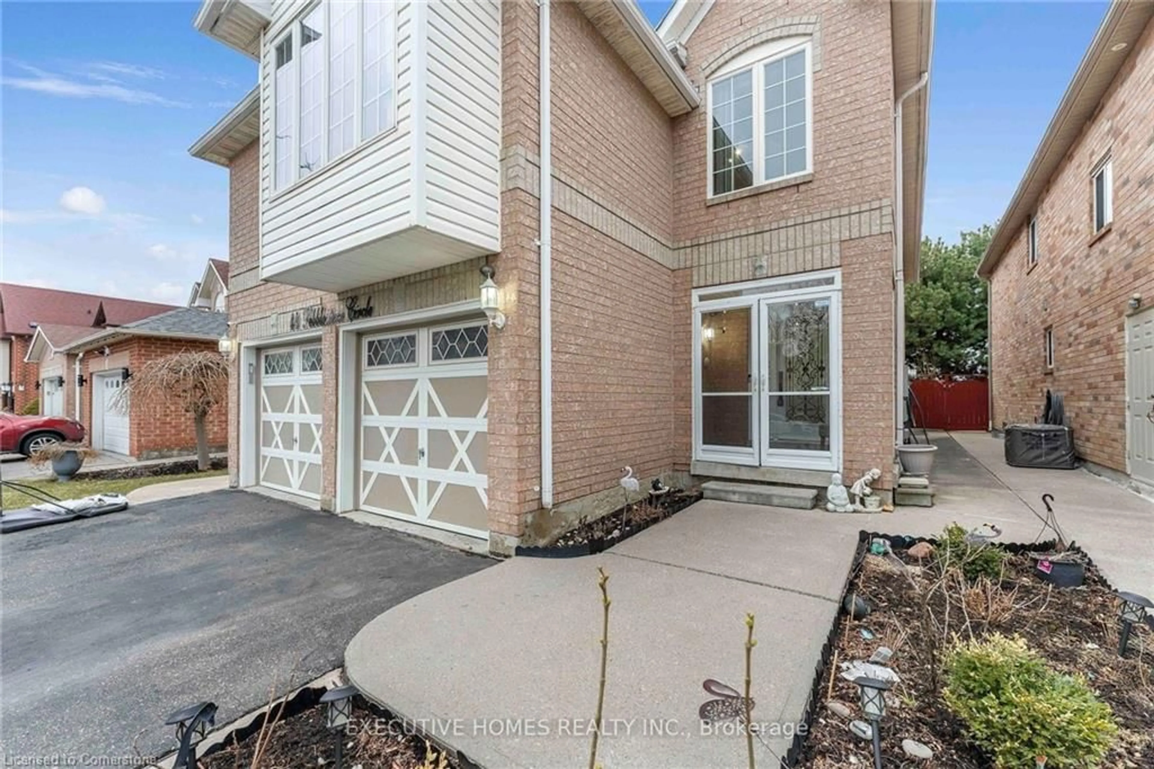 Home with brick exterior material, street for 44 Pebblestone Cir, Brampton Ontario L6X 4N2