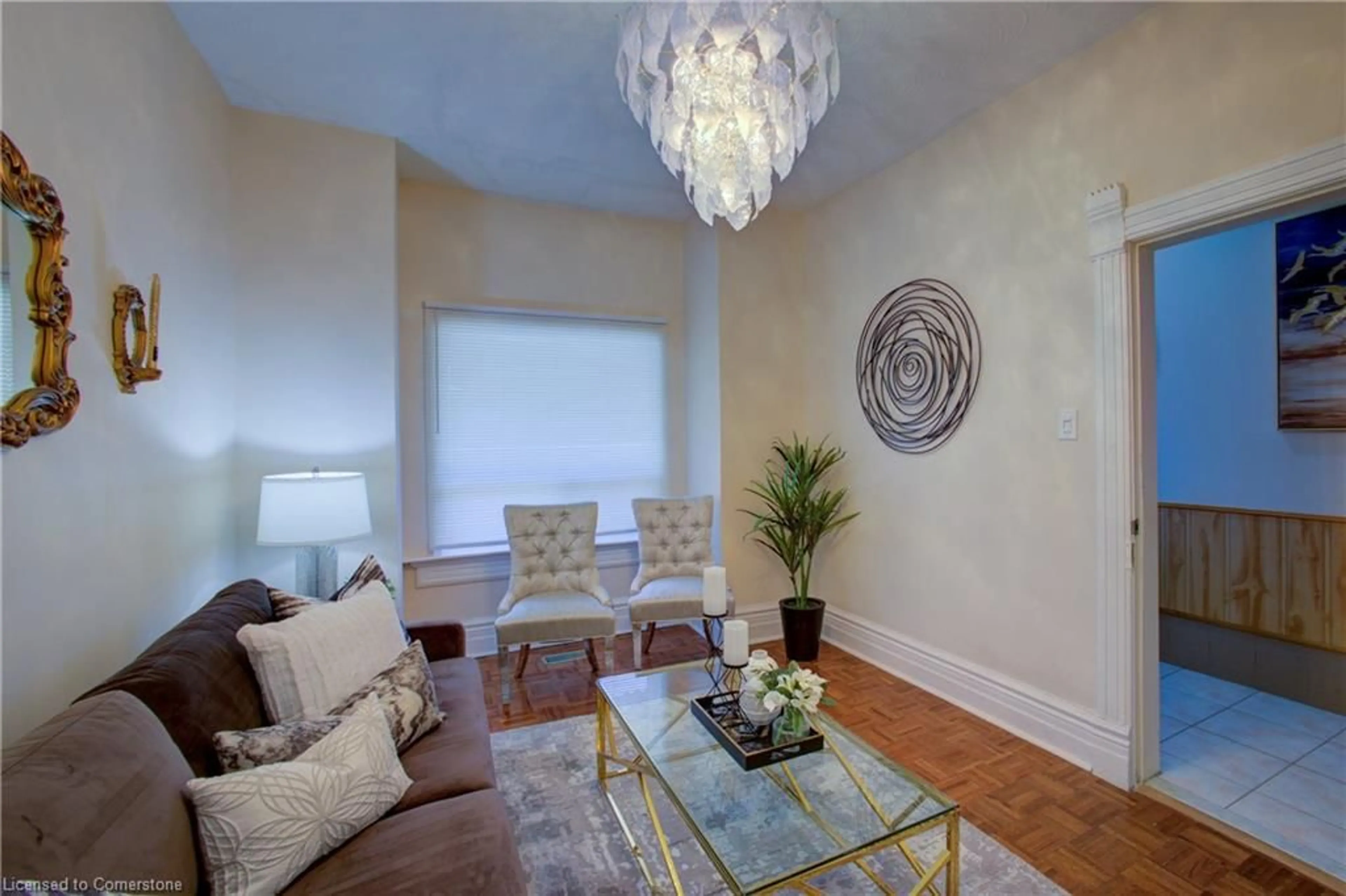 Living room with furniture, wood/laminate floor for 82 Uxbridge Ave, Toronto Ontario M6N 2Y2