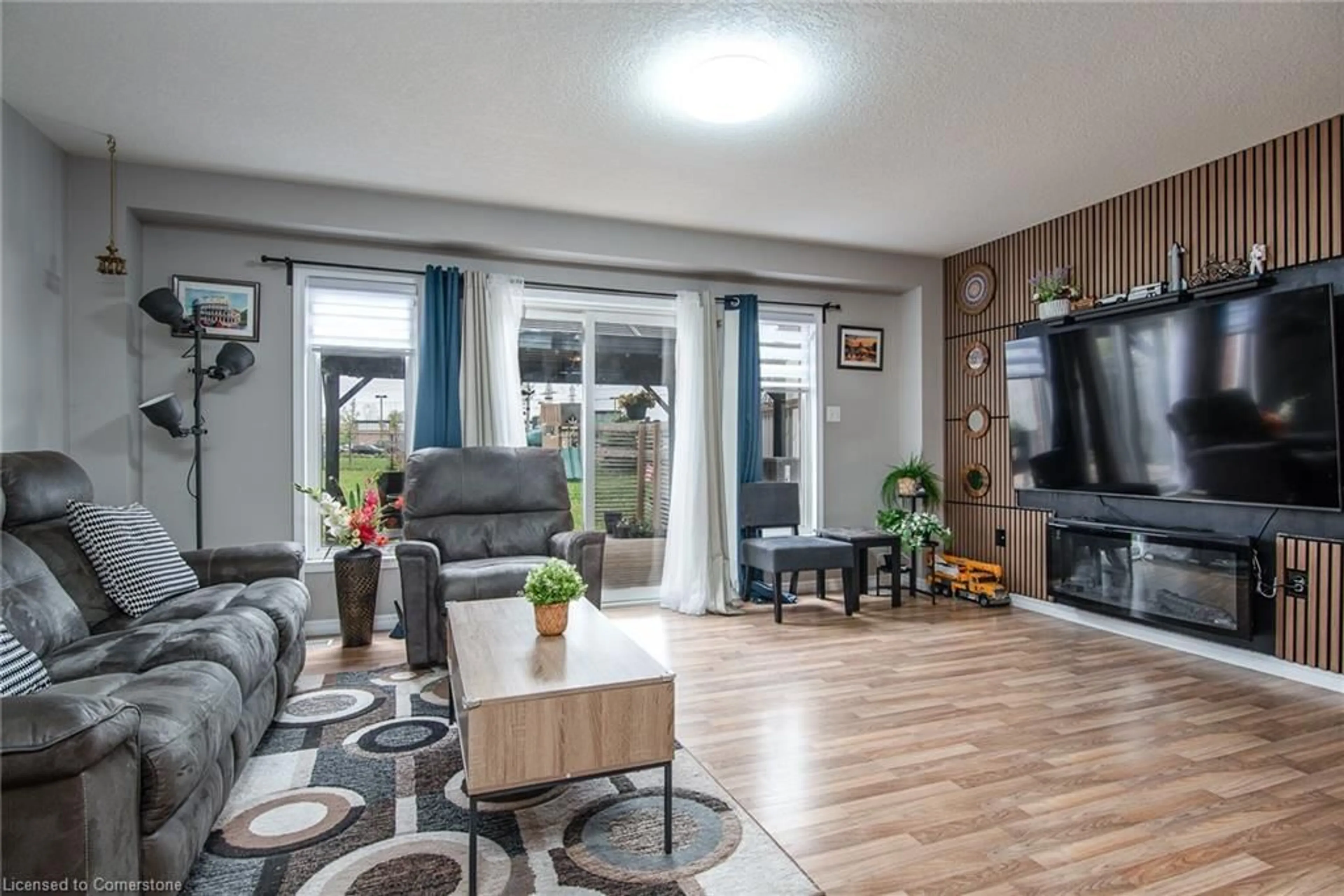 Living room with furniture, wood/laminate floor for 224 Westmeadow Dr, Kitchener Ontario N2N 3R1
