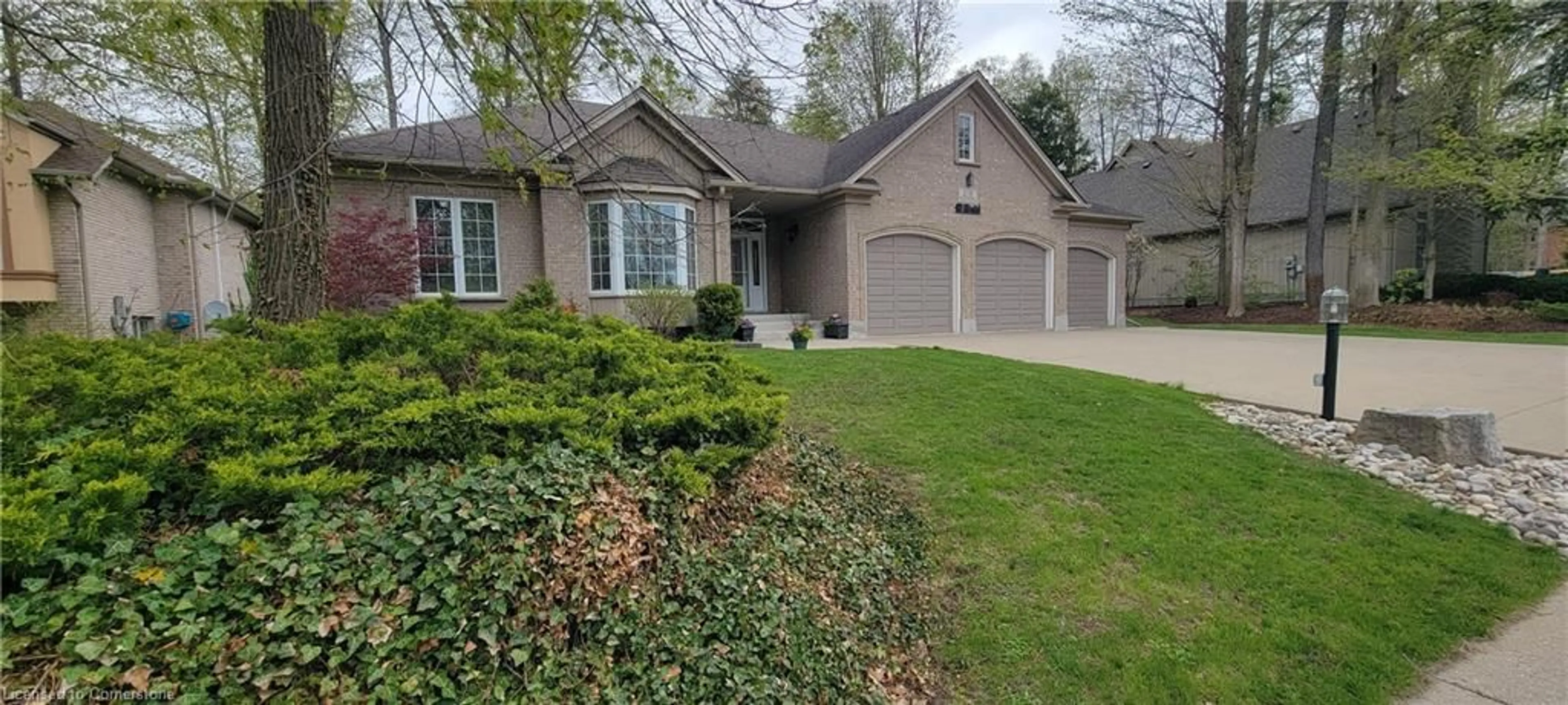 Home with brick exterior material, street for 218 Old Chicopee Dr, Kitchener Ontario N2A 4G6