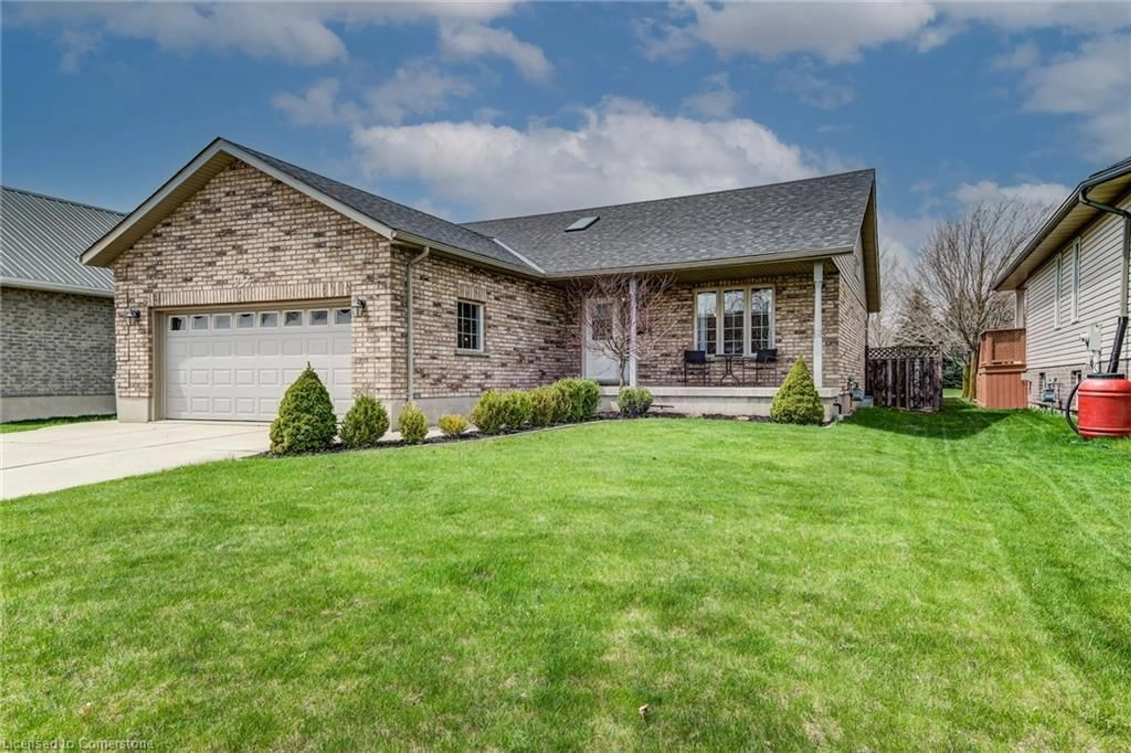 Home with brick exterior material, street for 935 Baker Ave, Listowel Ontario N4W 3V7