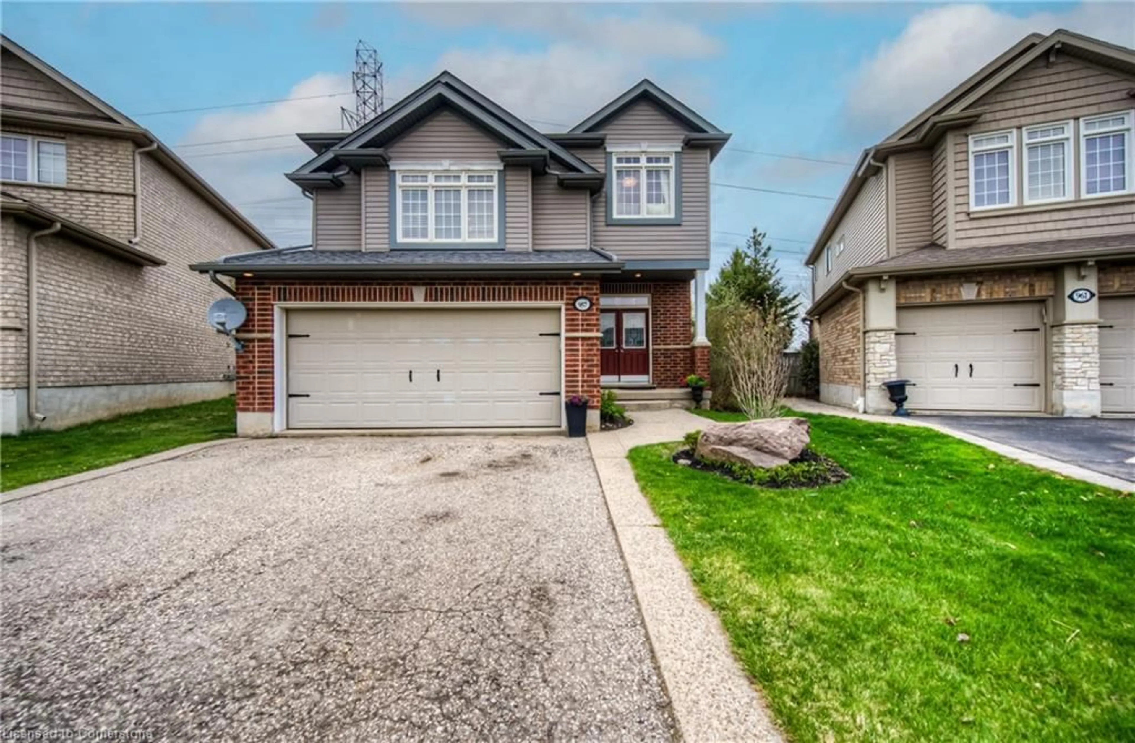 Home with brick exterior material, street for 957 Banffshire Crt, Kitchener Ontario N2R 1W8