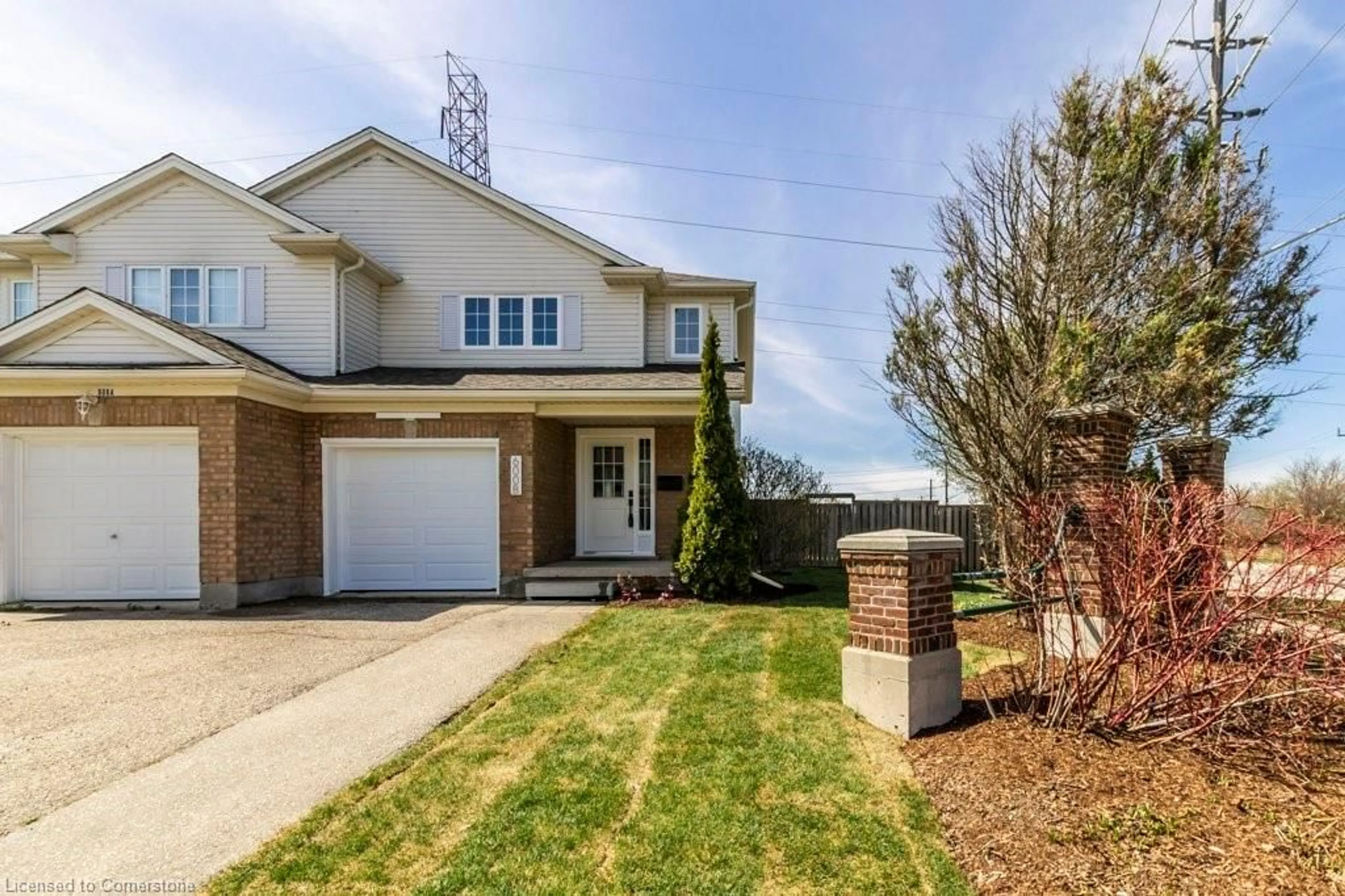 Home with brick exterior material, street for 600B Brandenburg Blvd, Waterloo Ontario N2T 2V3